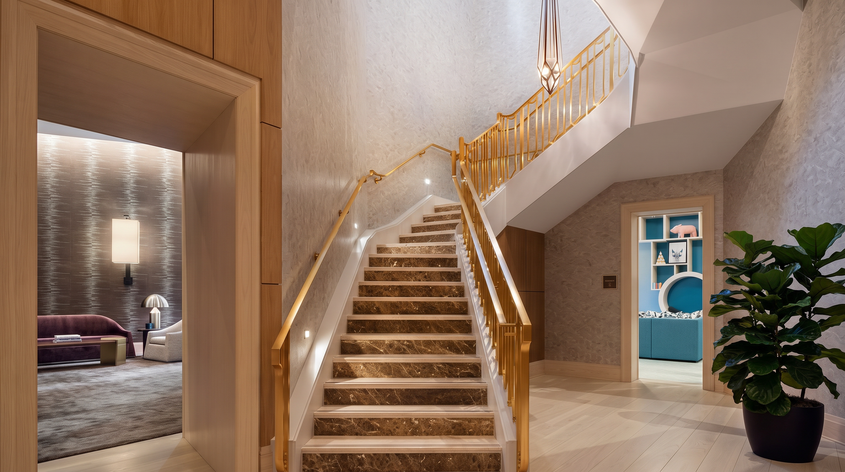 This grand foyer features a central staircase with dark stone treads and gold-toned railings, leading up toward a dramatic, light-filled landing. To the left, a wood-paneled entryway opens into a lounge area, while a doorway on the right reveals a colorful, modern room. The space is defined by its high ceilings, textured wall finishes, and a striking geometric pendant light, creating an elegant and sophisticated atmosphere.