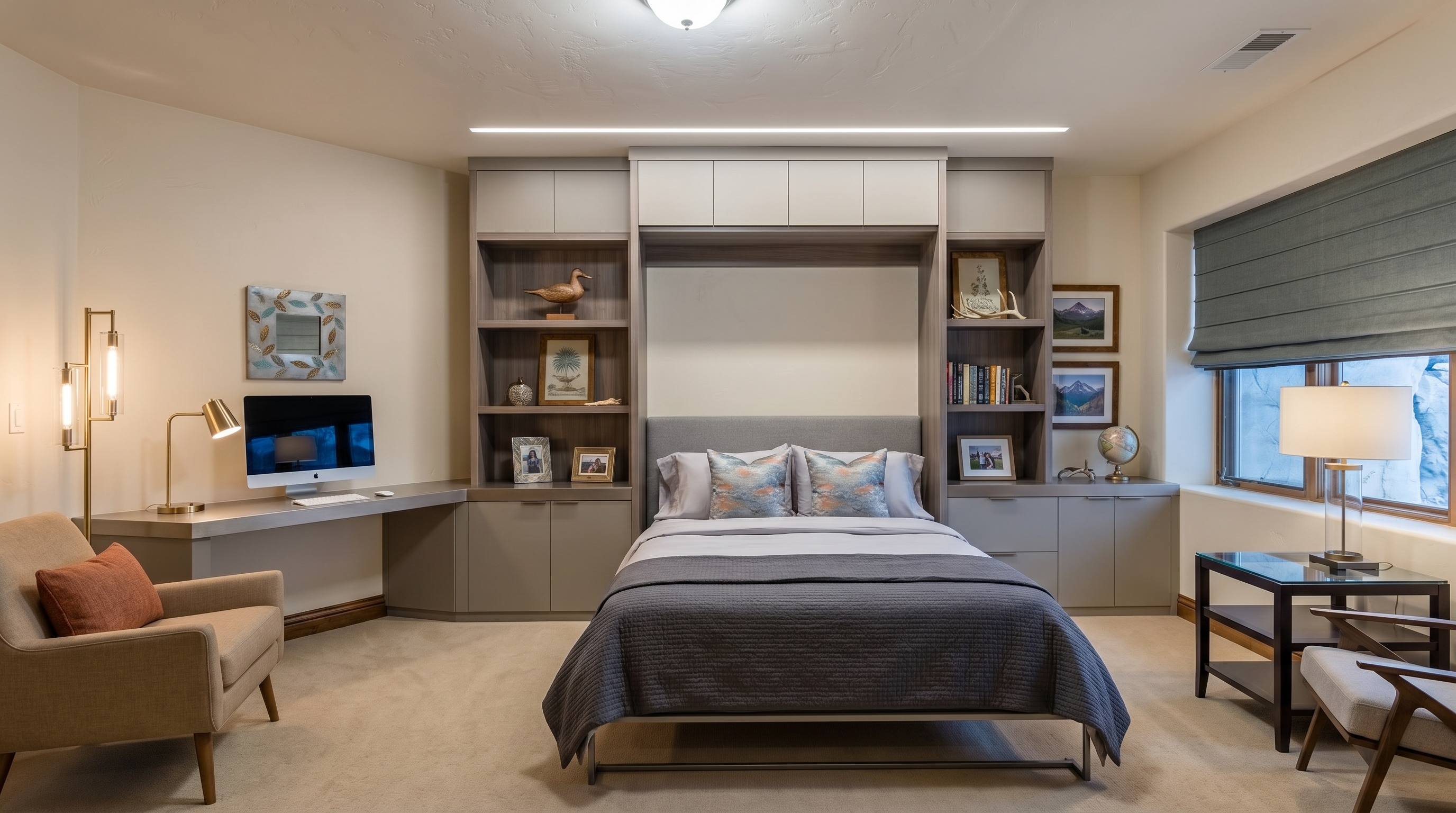 This primary bedroom features a neutral color palette with a plush, white-covered bed centered against a wall adorned with three framed botanical prints. To the left, a cozy, textured armchair with an orange accent pillow sits beside a tall floor lamp, while matching bedside tables and lamps frame the bed. A large window with a Roman shade on the right allows natural light to brighten the space, which is finished with wall-to-wall carpeting.