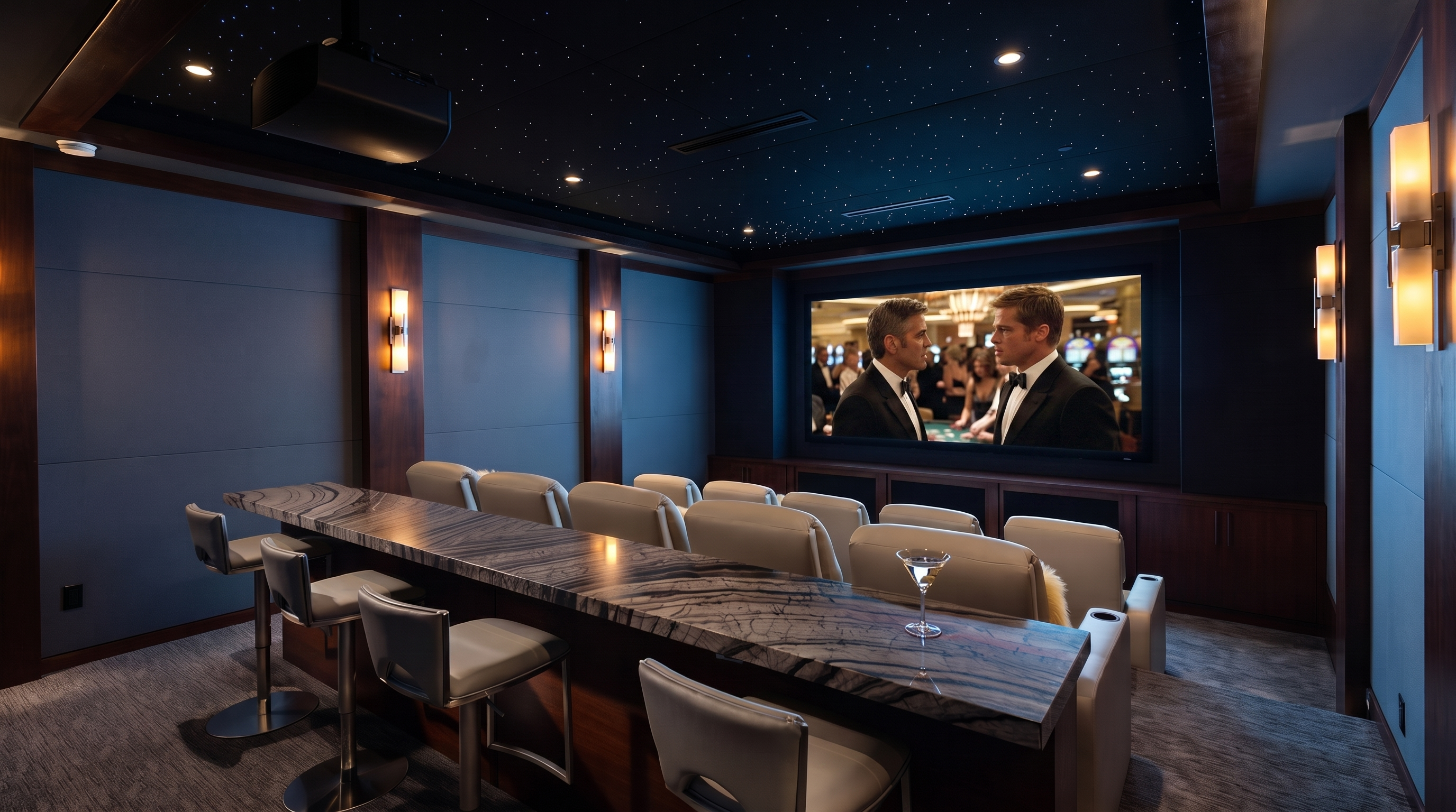 This dedicated home theater features a tiered seating arrangement with a row of bar-style stools at a stone-topped counter followed by a row of plush, light-colored cinema chairs. The room is designed with dark wall paneling, integrated wall sconces, and a dramatic ceiling treatment that mimics a starry night sky. A large projection screen is mounted on the front wall above a dark wood cabinetry unit, creating an immersive viewing environment.