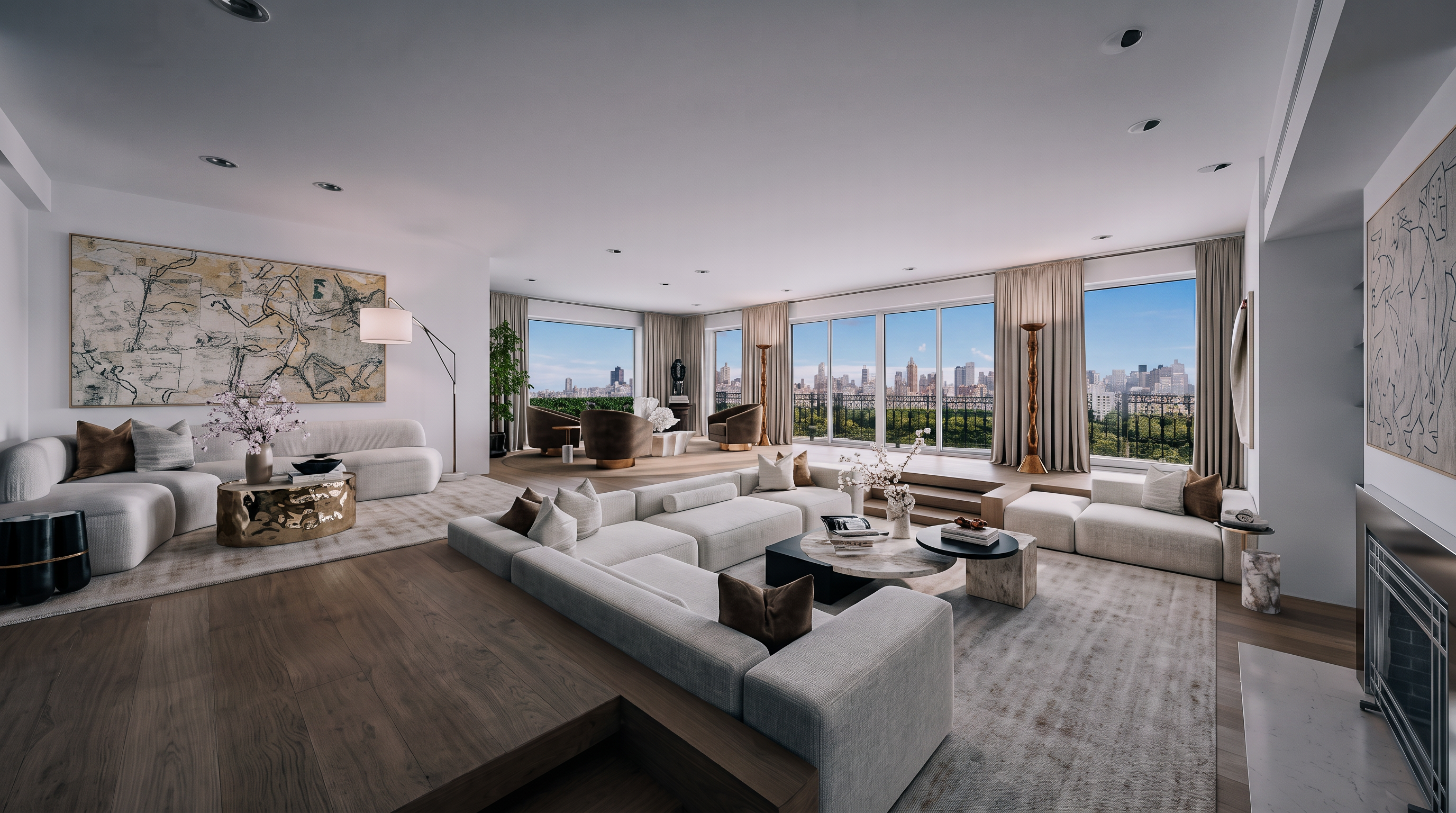 This expansive, open-concept living area features a sunken seating arrangement with plush, light-toned sofas and a central coffee table. Large windows span the rear wall, providing an unobstructed view of a park and city skyline, while light wood flooring adds warmth to the bright, airy space. The room is decorated with minimalist art and neutral textiles, creating a sophisticated and tranquil atmosphere.