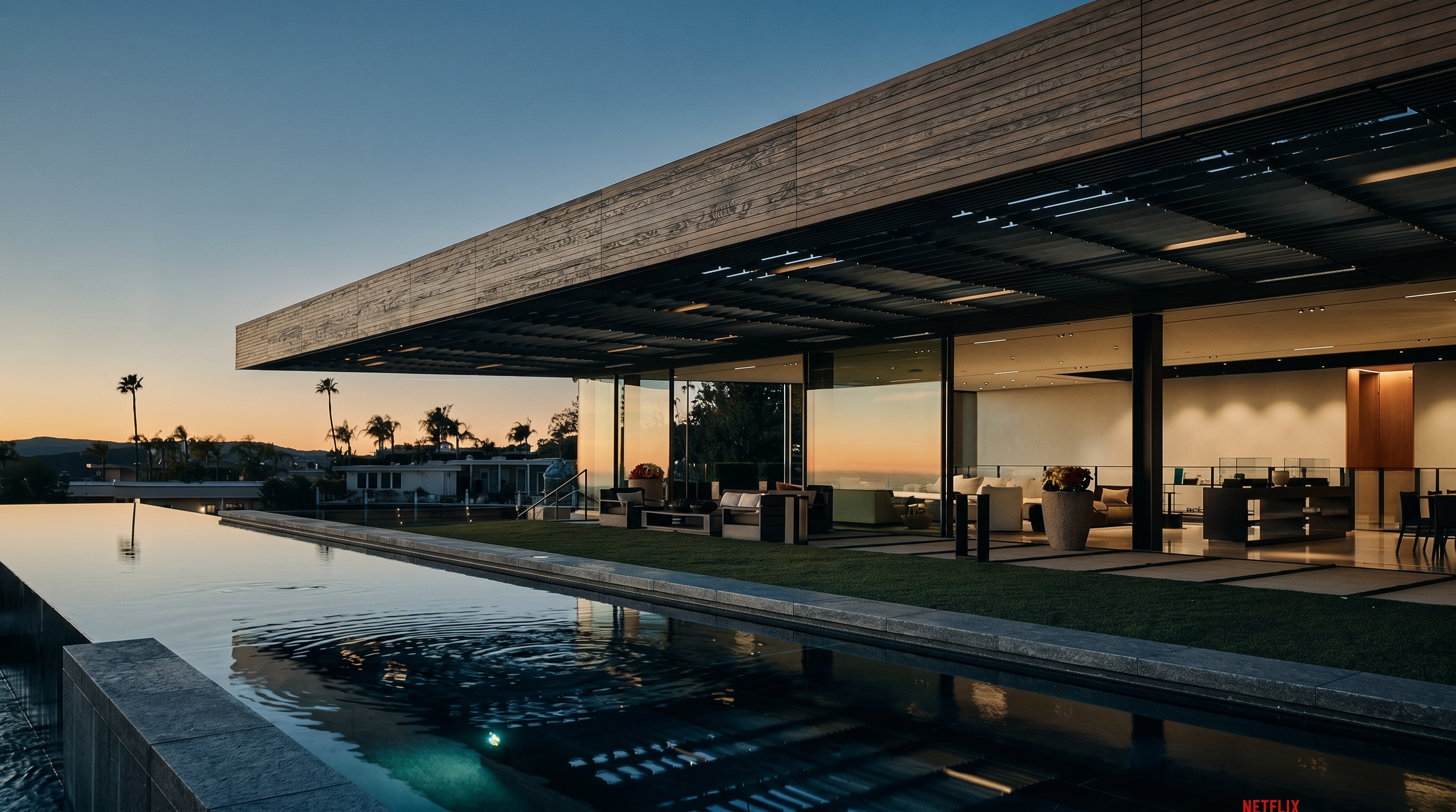 This stunning modern architectural masterpiece features a seamless indoor-outdoor transition with floor-to-ceiling glass walls opening onto a sleek infinity-edge pool. The expansive patio area, complete with contemporary outdoor furniture and manicured turf, overlooks a breathtaking sunset vista. The design emphasizes clean lines, luxury materials, and a sophisticated, open-concept aesthetic perfect for high-end entertaining.