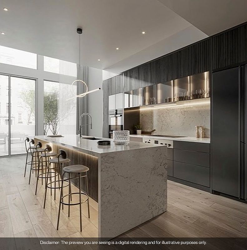 This is a modern kitchen with a large island featuring a waterfall countertop and bar stool seating. The kitchen includes sleek, dark cabinetry, stainless steel appliances, and open shelving with integrated lighting. Large windows provide ample natural light, enhancing the contemporary design and spacious feel of the kitchen.