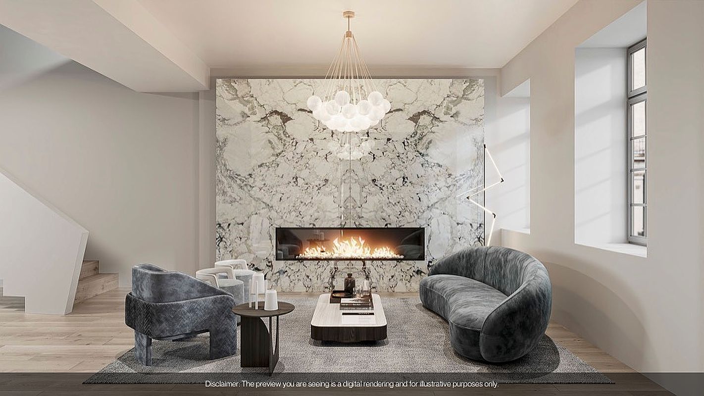 This is a luxurious living room featuring a modern fireplace with a marble surround, a unique bubble chandelier, and stylish, curved furniture. The color palette is neutral with gray and white tones, creating a sophisticated and inviting atmosphere. The room is well-lit, with natural light coming through the windows, enhancing the sense of spaciousness and elegance.