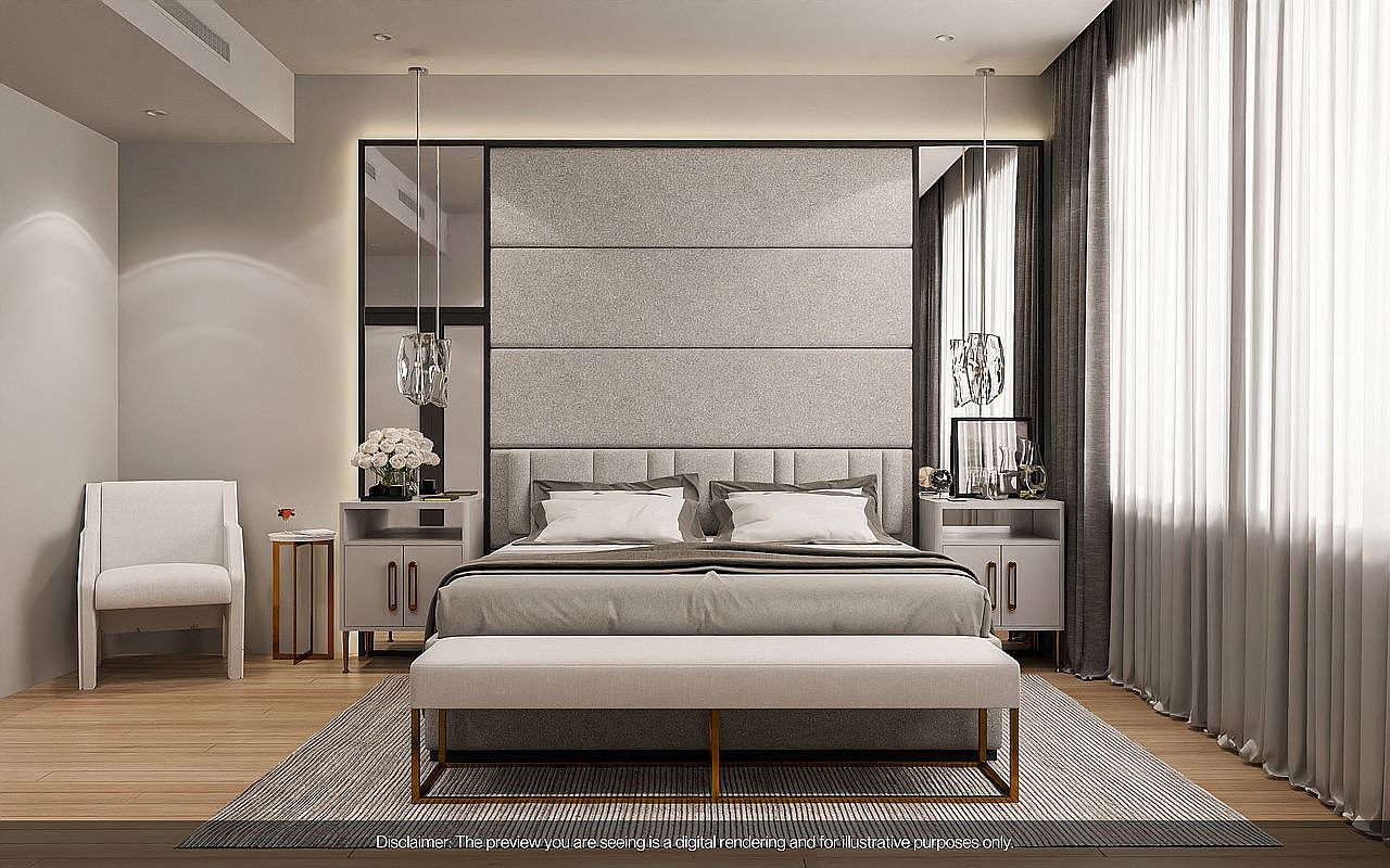 This is a beautifully staged primary bedroom featuring a large upholstered headboard, neutral color palette, and modern pendant lighting. The room includes a comfortable bed with crisp white linens, matching nightstands, and a stylish bench at the foot of the bed. The overall impression is one of serene luxury and comfort.