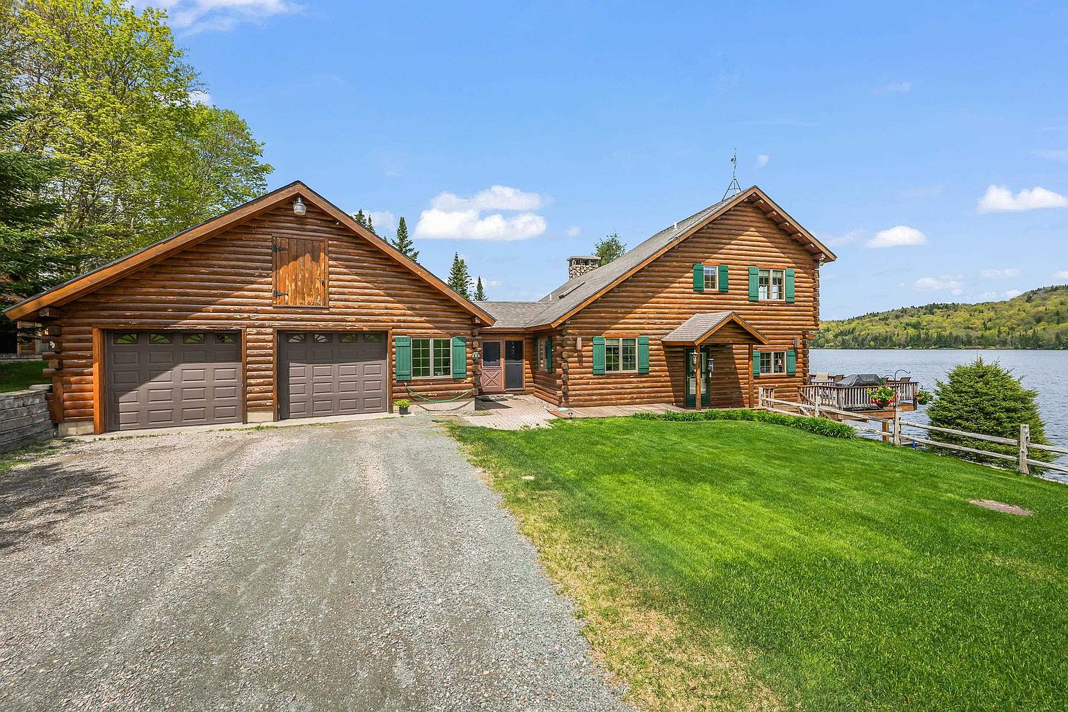 A Custom Log Retreat on Three Hundred Feet of Diamond Pond