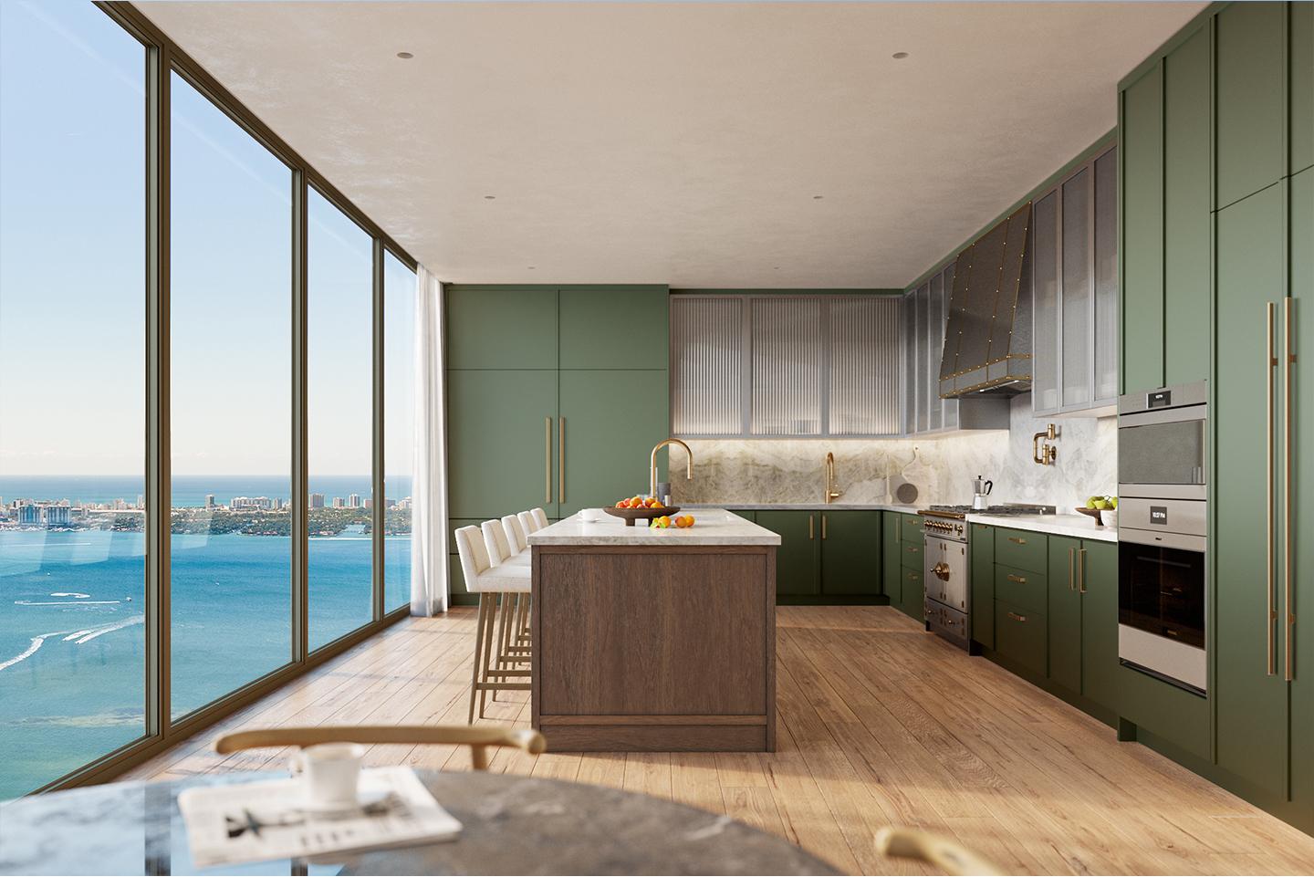 This is a modern kitchen with green cabinetry, a wood-paneled island with a white countertop, and stainless steel appliances. Large windows offer a stunning ocean view, enhancing the luxurious feel of the space. The kitchen features a blend of textures and materials, creating a sophisticated and inviting atmosphere.