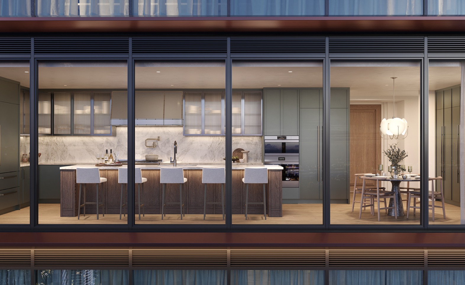 This image showcases a modern kitchen and dining area viewed through a large window. The kitchen features a central island with bar seating, marble countertops, and sleek cabinetry, while the dining area includes a round table with chairs and a contemporary chandelier. The overall design exudes sophistication and luxury, perfect for highlighting the upscale features of the property.