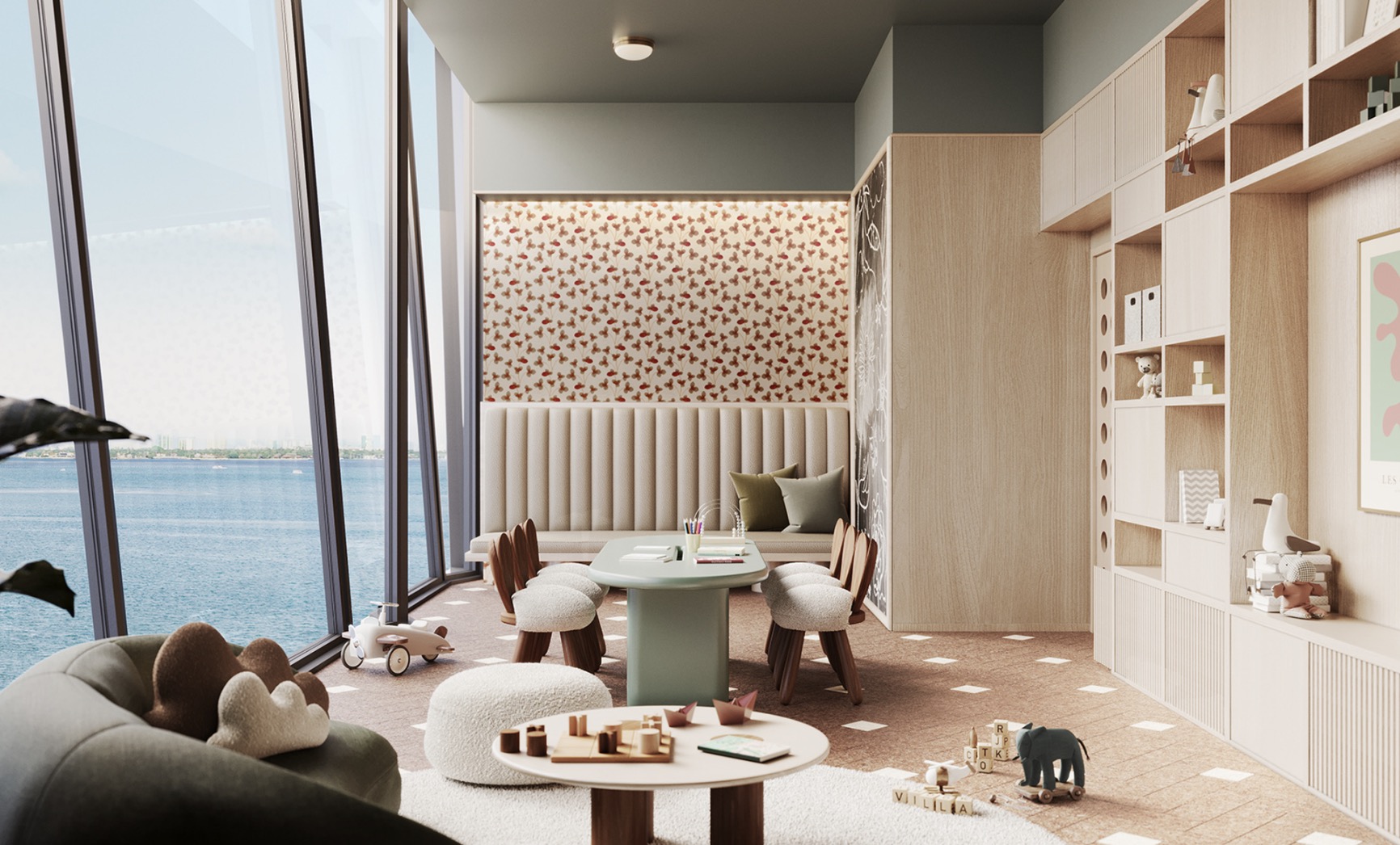 This is a bright and airy living room designed with children in mind, featuring large windows with ocean views. The room includes a built-in seating area with patterned wallpaper, a round table with chairs, and a custom shelving unit with toys and decorative items. The color palette is soft and neutral, creating a calming and inviting space.