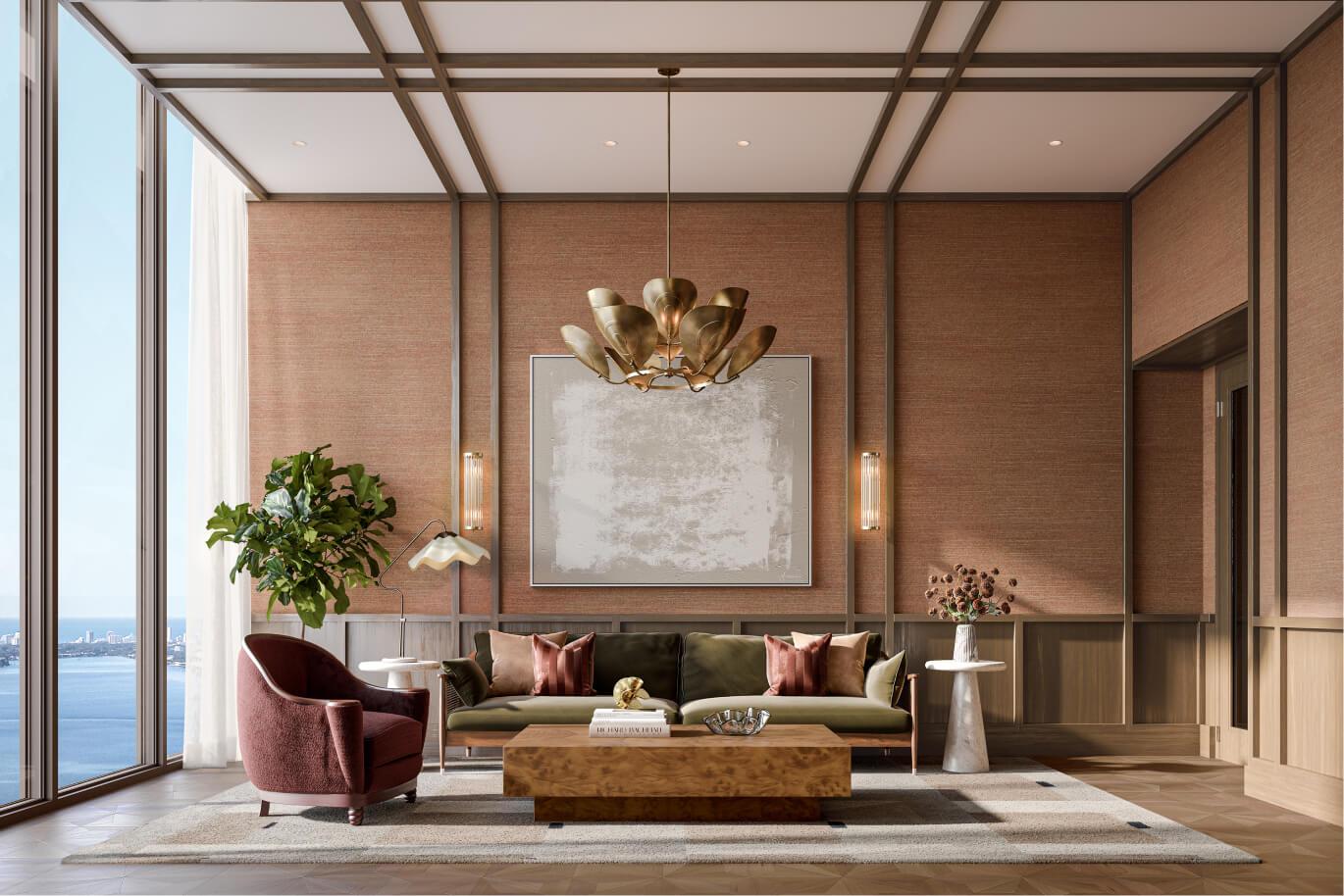 This is a luxurious living room featuring a plush green sofa with decorative pillows, a stylish armchair, and a unique wooden coffee table. A large abstract painting hangs above the sofa, complemented by elegant wall sconces and a statement chandelier. The room is bathed in natural light from the large windows, offering a stunning view of the water.