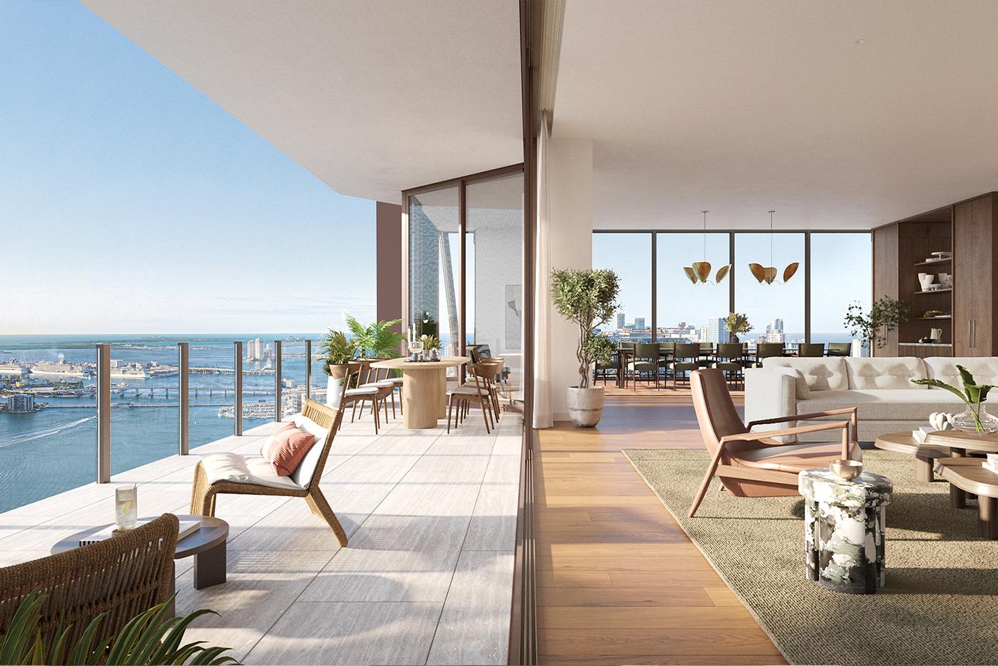 This image showcases a luxurious living space that seamlessly blends indoor and outdoor living. The interior features a modern aesthetic with a neutral color palette, hardwood floors, and floor-to-ceiling windows offering stunning city and ocean views. A spacious balcony extends the living area, furnished with comfortable seating and a dining set, perfect for enjoying the scenery.
