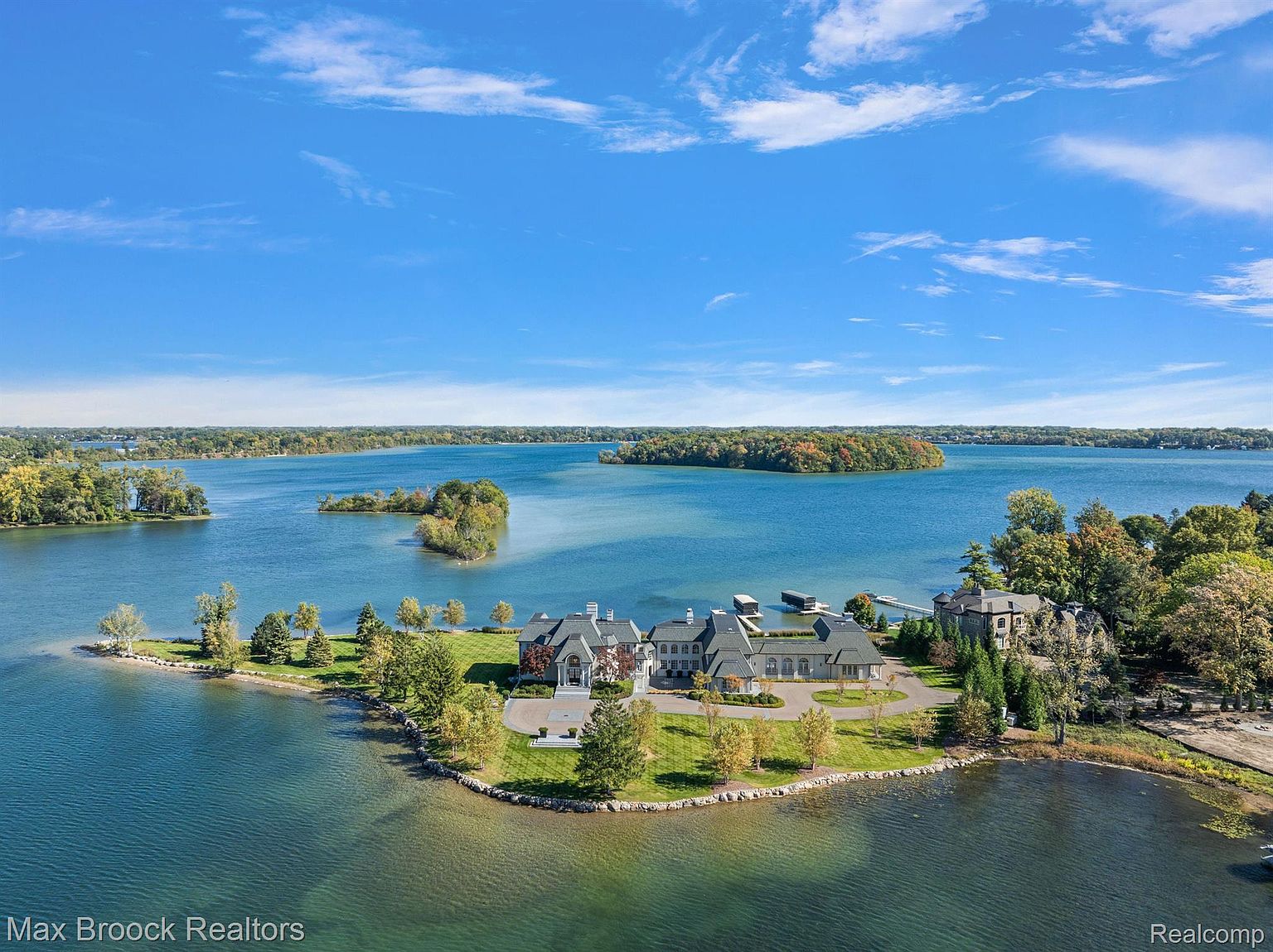 Exclusive Peninsula Estate with Sunrise-to-Sunset Lake Views