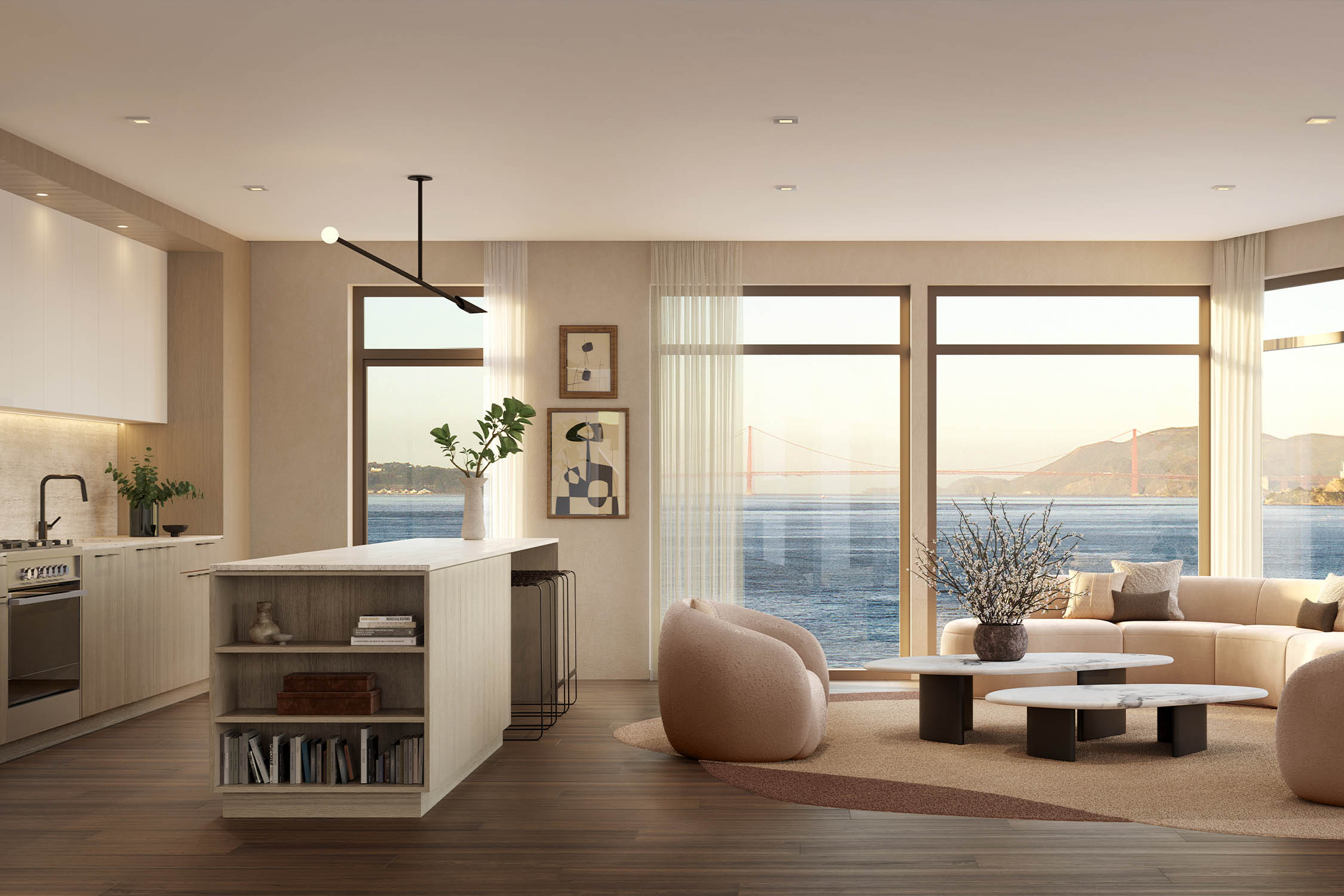 This is a bright and airy open-concept living space featuring a modern kitchen with an island, a comfortable living area with a curved sofa and stylish coffee tables, and large windows offering stunning views of the Golden Gate Bridge. The interior design is contemporary with neutral tones and natural materials, creating a serene and inviting atmosphere. The perspective is wide, showcasing the seamless flow between the kitchen and living areas.