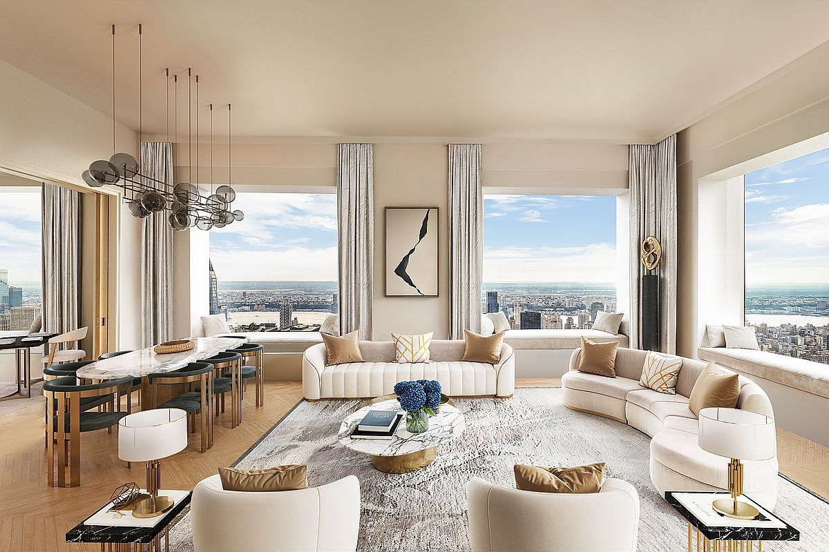 This is a luxurious living room featuring a neutral color palette, high-end furnishings, and expansive windows offering panoramic city views. The room includes multiple seating areas with plush sofas and armchairs, a marble coffee table, and a stylish dining area with a unique chandelier. The overall impression is one of sophisticated elegance and modern comfort.