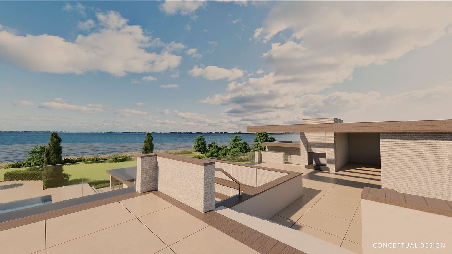 This image showcases a modern patio or deck area with a sleek design, featuring light-colored tiling and minimalist architectural elements. The space includes a glass railing offering unobstructed views of the water and surrounding landscape, creating a serene and luxurious outdoor living area. The design emphasizes clean lines and open space, perfect for relaxation and entertainment.