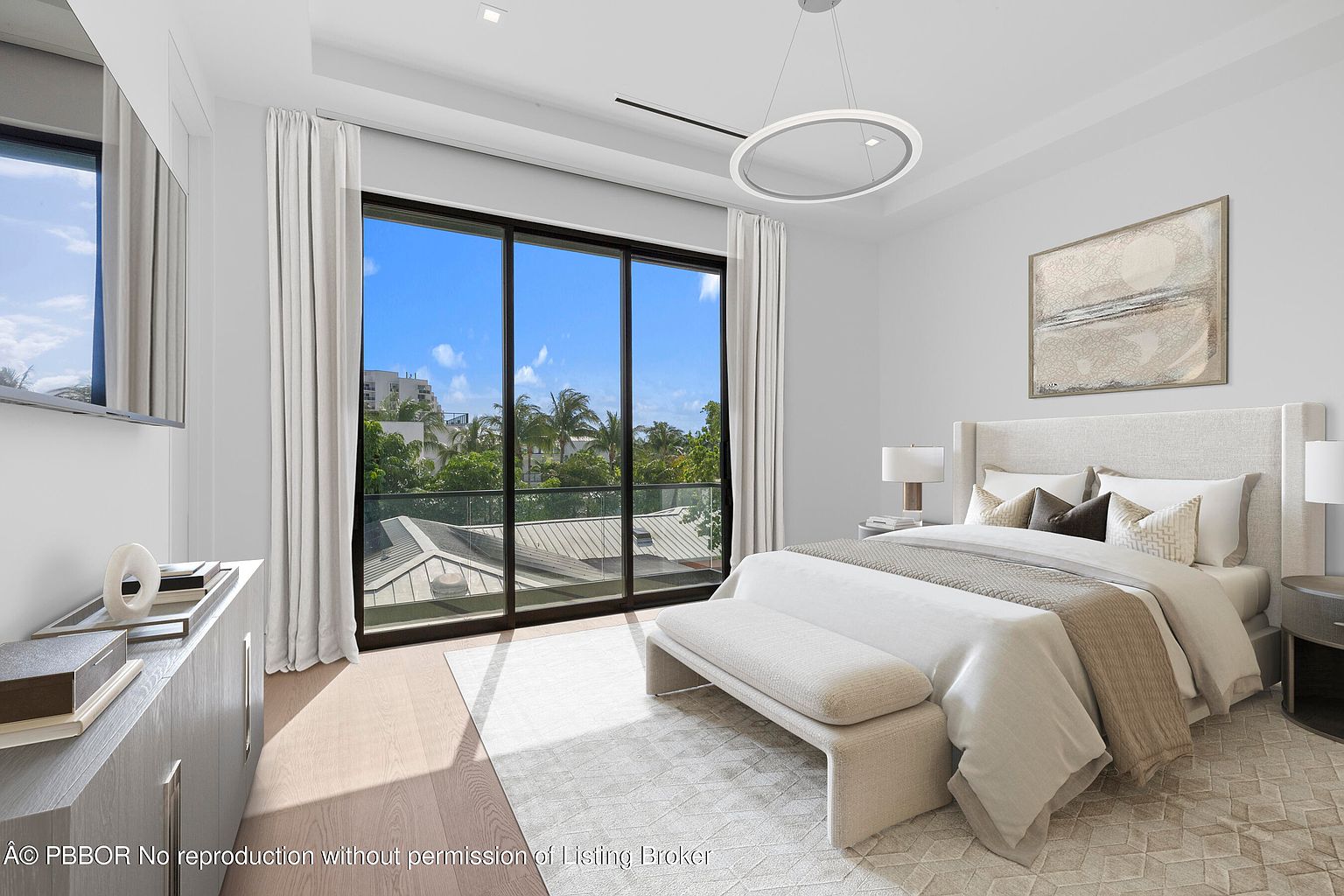This is a bright and airy primary bedroom featuring a large window with a view of lush greenery and a blue sky. The room is decorated in neutral tones with a large bed, a bench at the foot of the bed, and modern lighting fixtures. The overall impression is one of tranquility and luxury.