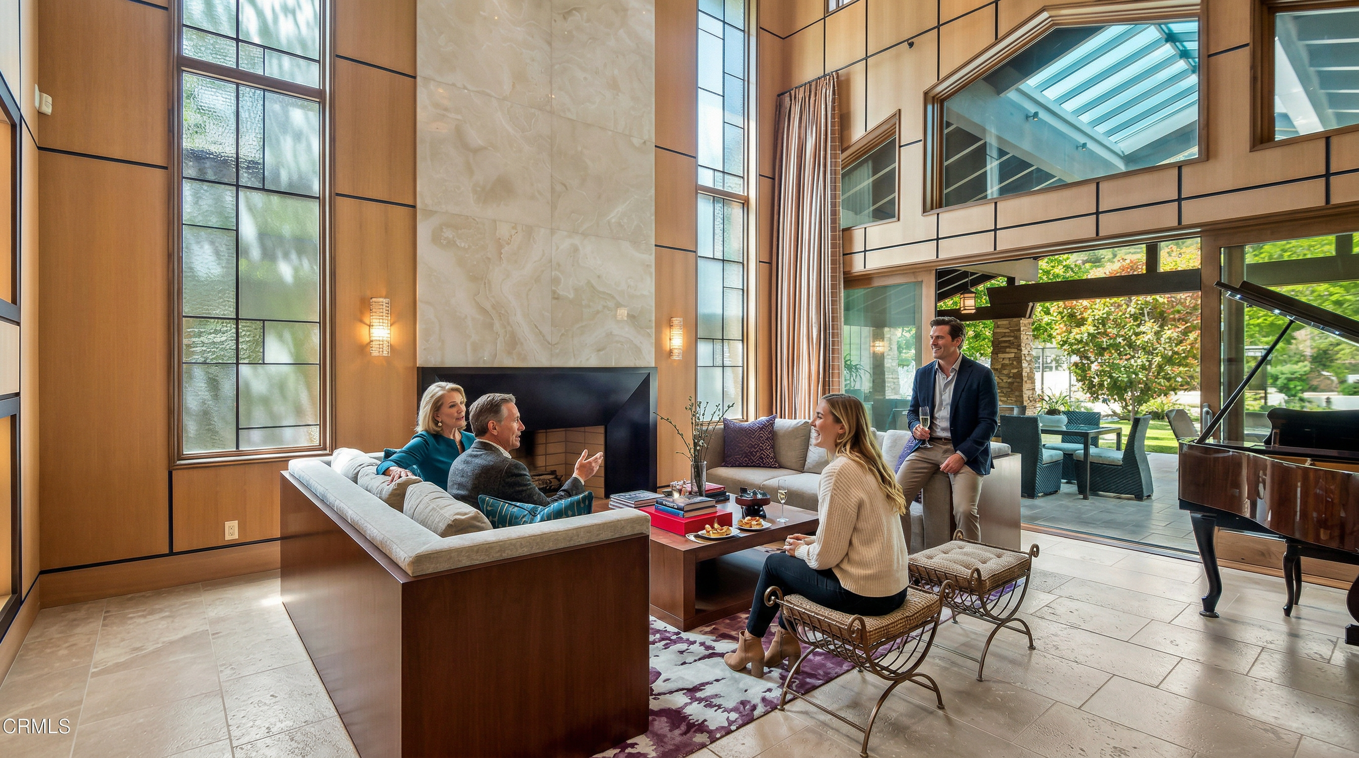 This expansive, double-height living room features a dramatic floor-to-ceiling stone fireplace as its centerpiece, framed by elegant wood-paneled walls and towering windows. The space is furnished with a plush, modern sofa arrangement and a grand piano, creating a sophisticated atmosphere that seamlessly transitions to an outdoor patio through large glass doors. The combination of natural light, high-end materials, and open-concept design conveys a sense of luxury and architectural grandeur.