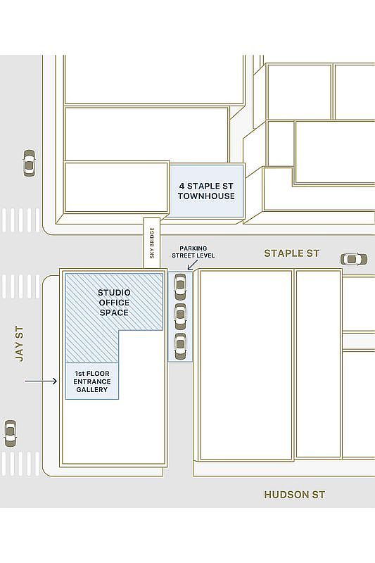 This image is a stylized, top-down architectural site map illustrating the layout of a property located at the intersection of Jay St, Staple St, and Hudson St. It highlights key features including the '4 Staple St Townhouse,' a 'Studio Office Space,' a '1st Floor Entrance Gallery,' and a 'Sky Bridge' connecting the structures. The map provides a clear, schematic overview of the building footprints, street-level parking, and pedestrian access points, offering a professional and informative perspective for potential buyers.