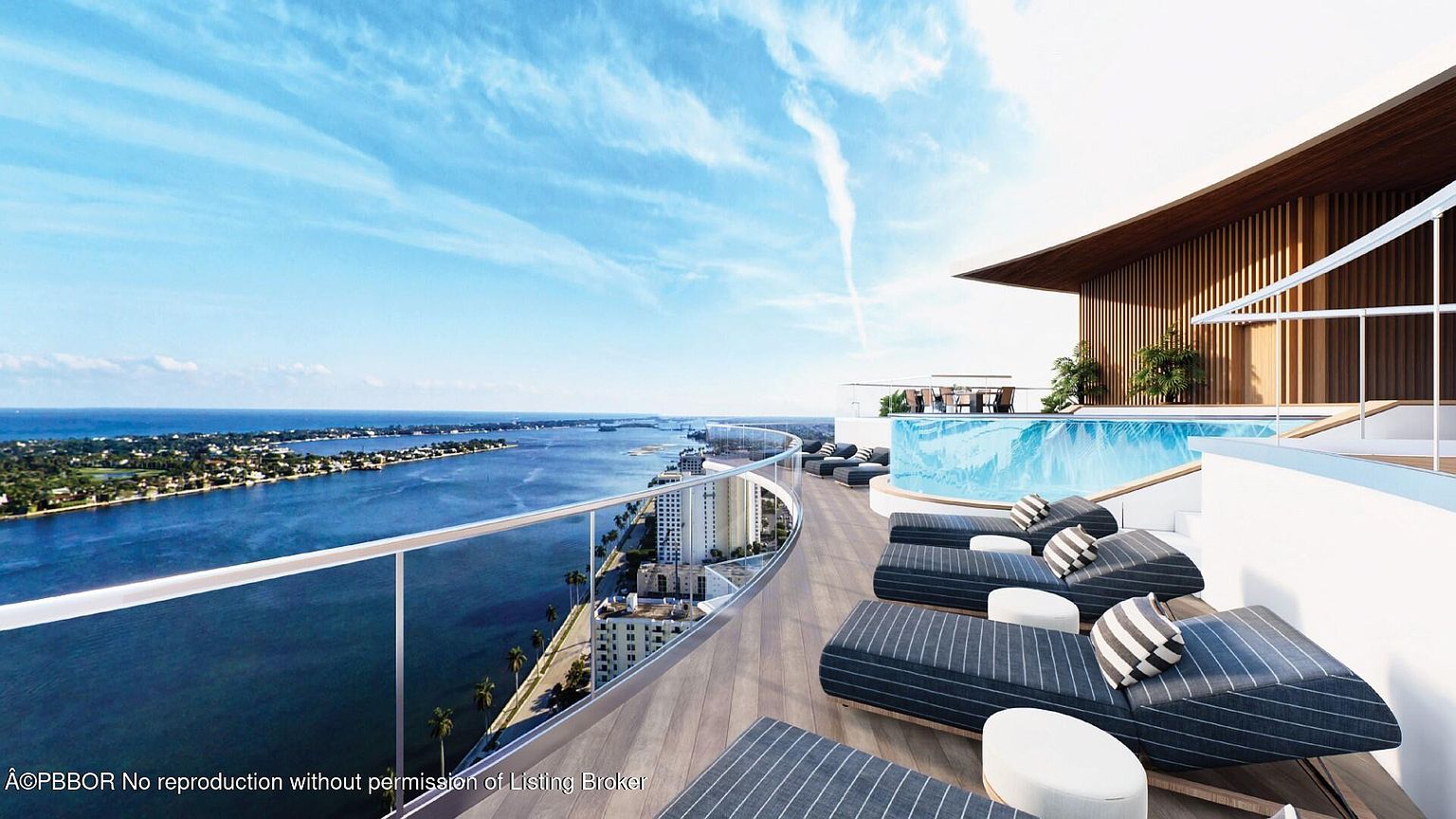 This image showcases a luxurious rooftop pool and deck area with stunning panoramic views of the ocean and city skyline. The deck features modern lounge chairs and a sleek infinity pool, creating an inviting and upscale atmosphere. The architectural design incorporates clean lines and natural materials, enhancing the overall elegance of the space.