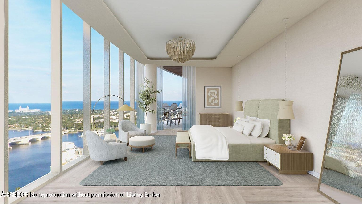 This is a luxurious primary bedroom featuring floor-to-ceiling windows with stunning water views. The room is decorated in neutral tones with a large bed, seating area, and elegant chandelier. The overall impression is one of spaciousness, light, and high-end comfort.
