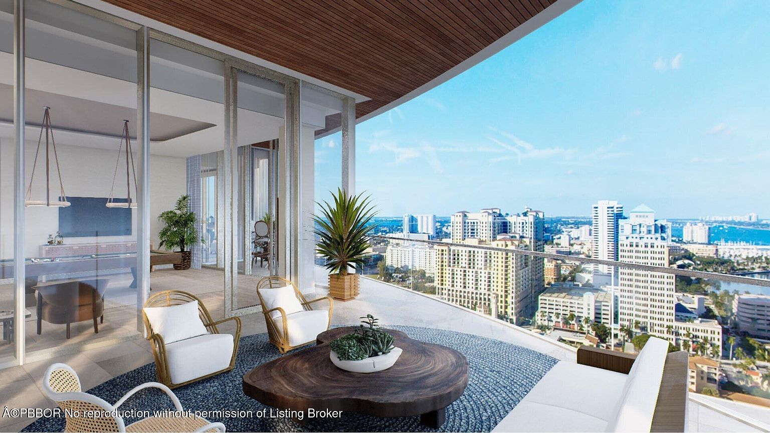 This image showcases a luxurious balcony with stylish outdoor furniture, including wicker chairs with white cushions and a modern sofa. A unique wooden coffee table and potted plants add to the sophisticated ambiance. The balcony offers stunning panoramic views of the city skyline and the ocean, creating an inviting and upscale outdoor living space.