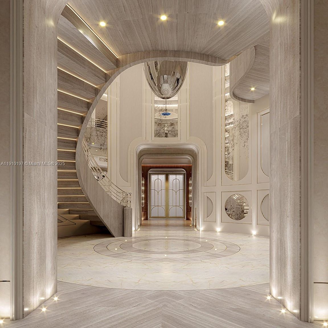 This grand entryway features a sweeping staircase with integrated lighting, leading to an upper level. The space is characterized by high ceilings, elegant architectural details, and a circular marble floor design. A large, reflective pendant light hangs above, adding to the luxurious and sophisticated ambiance.