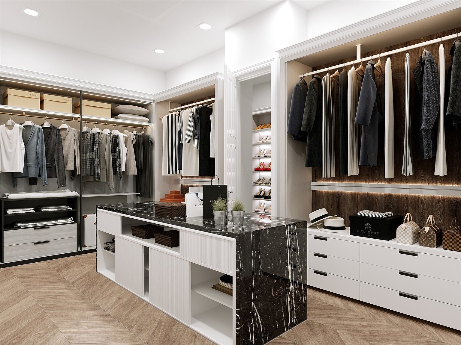 This is a well-organized walk-in closet featuring custom shelving, hanging rods, and a central island with a marble countertop. The closet is illuminated with recessed lighting and features a mix of open storage and drawers. The overall impression is luxurious and functional, offering ample space for clothing and accessories.
