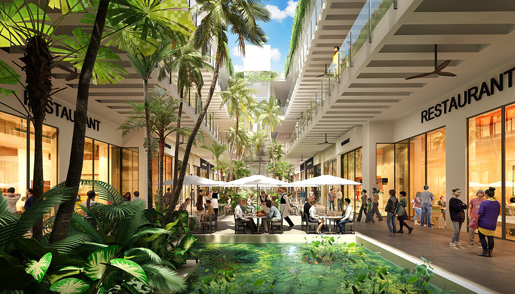 This image showcases a vibrant outdoor shopping center with a tropical theme. Lush greenery and palm trees surround the stores and restaurants, creating a relaxed and inviting atmosphere. The design incorporates water features and ample seating, making it an appealing destination for shoppers and diners.