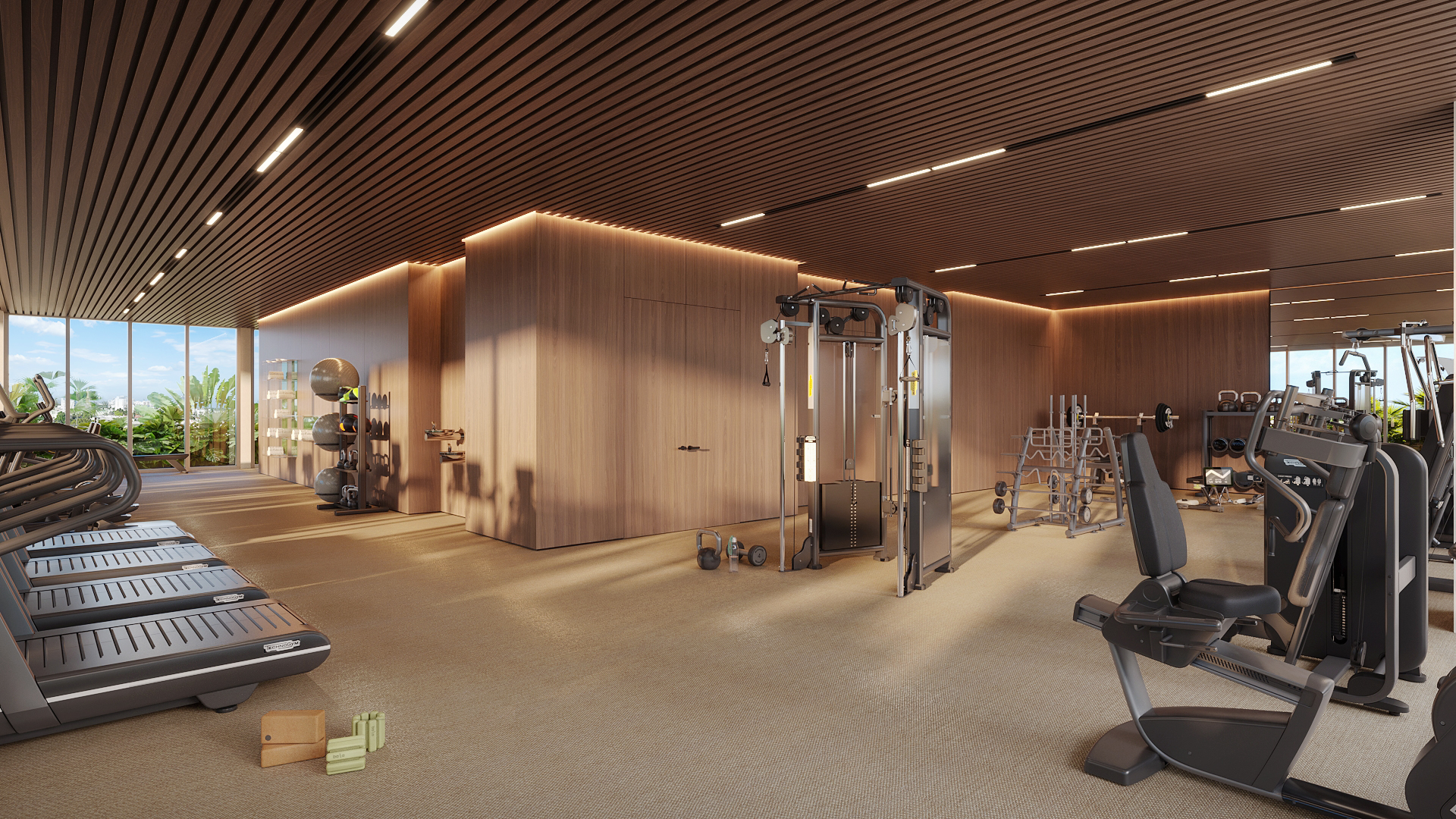 This is a well-equipped home gym featuring modern exercise machines, including treadmills and weight training equipment. The space is illuminated by recessed lighting and has a wood-paneled ceiling and walls, creating a warm and inviting atmosphere. Large windows provide natural light and a view of the outdoors.