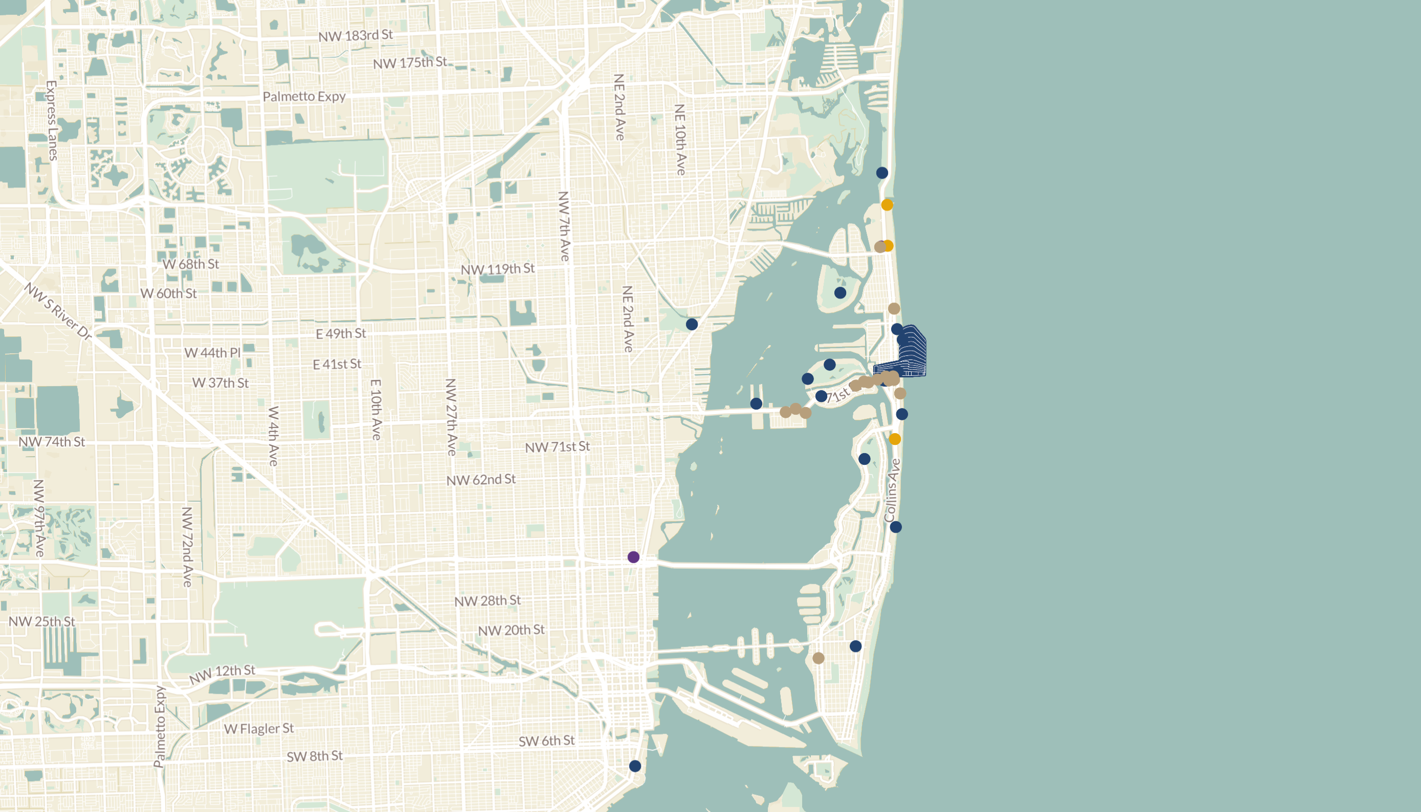 This is an aerial view map showcasing a coastal area, possibly for real estate purposes. The map highlights the proximity of residential areas to the waterfront, featuring markers indicating various points of interest or properties. The layout emphasizes the coastal lifestyle and access to amenities in the area.