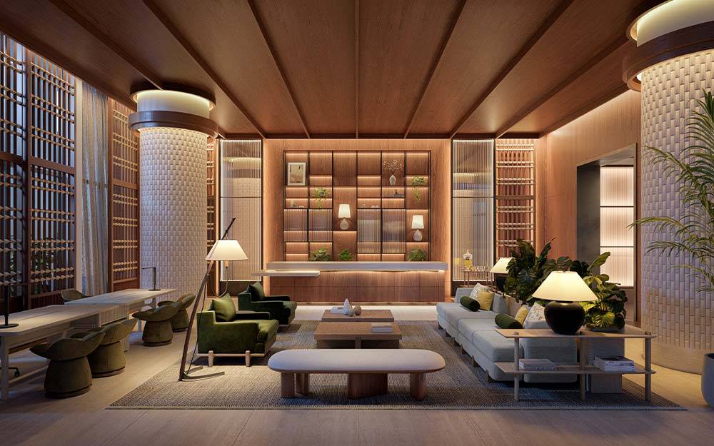 This is a well-lit, modern living room featuring a blend of natural wood tones and soft, neutral colors. The room includes comfortable seating arrangements with green armchairs and a light blue sofa, complemented by a long bench and wooden coffee tables. The space is decorated with plants and lamps, creating a warm and inviting atmosphere, and the architectural details, such as the wood-paneled ceiling and tiled columns, add a touch of sophistication.