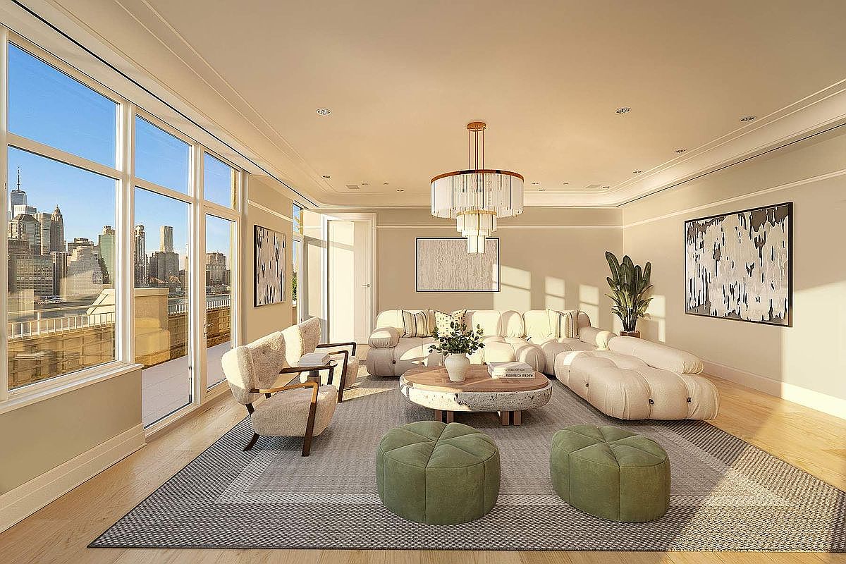This sophisticated living room features a contemporary, neutral-toned design with a plush modular sofa, textured armchairs, and two sage green ottomans arranged around a unique stone coffee table. Large floor-to-ceiling windows flood the space with natural light and offer a stunning, panoramic view of the New York City skyline. The room is accented by a modern tiered chandelier and abstract wall art, creating an atmosphere of refined luxury and urban elegance.
