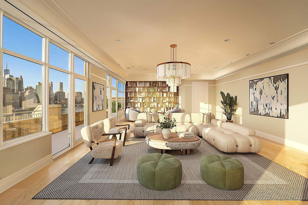 This sophisticated, sun-drenched living room features a contemporary design with a plush, modular sectional sofa, two textured armchairs, and a unique stone-base coffee table. The space is anchored by a large, patterned area rug and accented with two olive-green ottomans, all set against a backdrop of floor-to-ceiling windows that offer a stunning, panoramic view of the New York City skyline. A grand, tiered chandelier serves as a focal point, while a floor-to-ceiling bookshelf adds a touch of refined elegance to the airy, open-concept layout.
