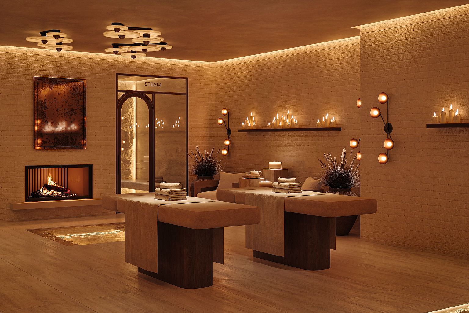 This luxurious spa facility features two massage tables centered in a warm, ambient-lit room with textured brick walls. A fireplace adds a cozy focal point to the left, while a glass-enclosed steam room and decorative wall sconces enhance the tranquil, high-end atmosphere. The space is accented with numerous candles and dried floral arrangements, creating a serene and inviting environment for relaxation.