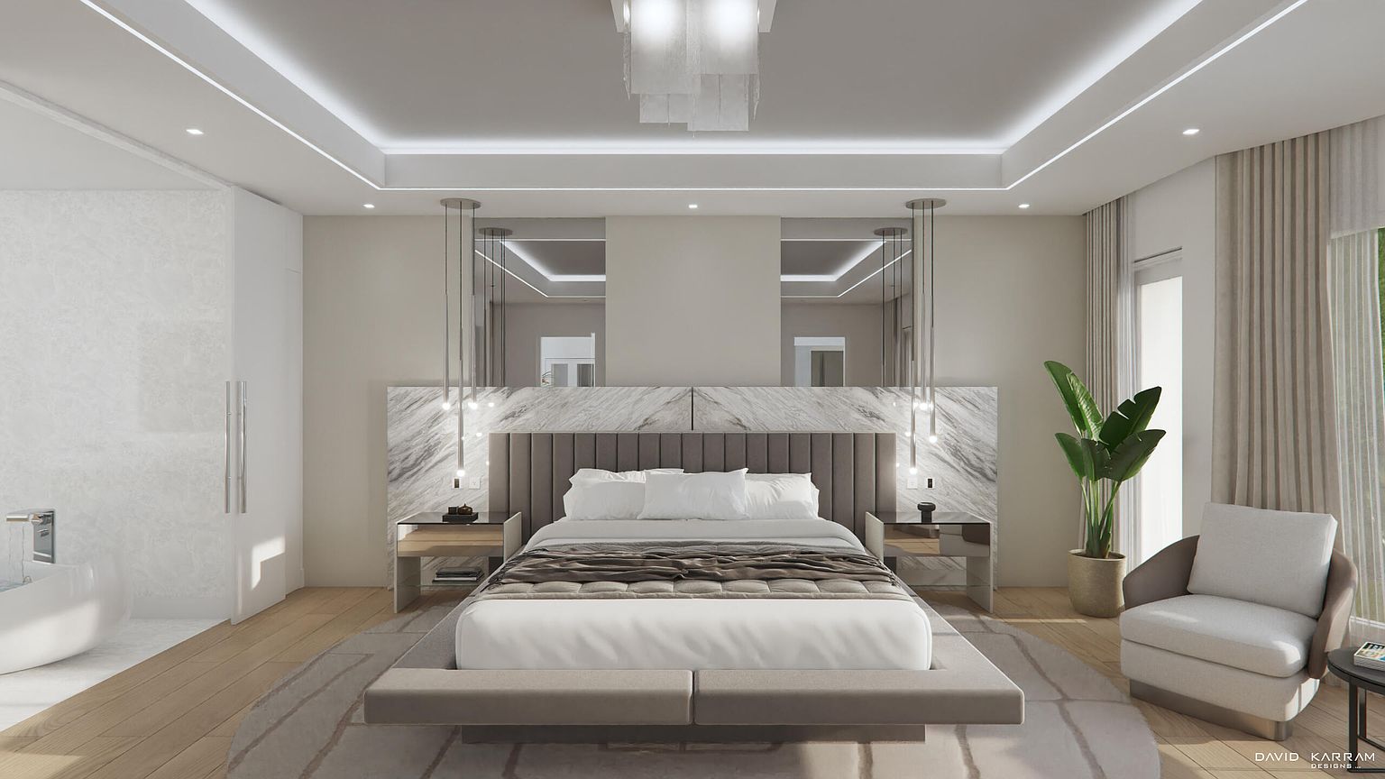 This is a luxurious primary bedroom featuring a king-size bed with a padded headboard and marble accents. The room is decorated in neutral tones with modern lighting fixtures and includes a seating area with a comfortable armchair. The overall impression is one of elegance and tranquility, perfect for relaxation.
