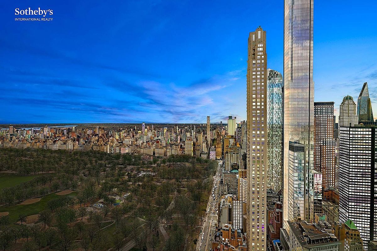 This high-altitude aerial view captures a breathtaking perspective of Central Park and the surrounding New York City skyline at dusk. The composition highlights the dramatic contrast between the lush, dark expanse of the park and the towering, illuminated skyscrapers that define the urban landscape. The perspective is cinematic, emphasizing the scale and prestige of this prime real estate location.