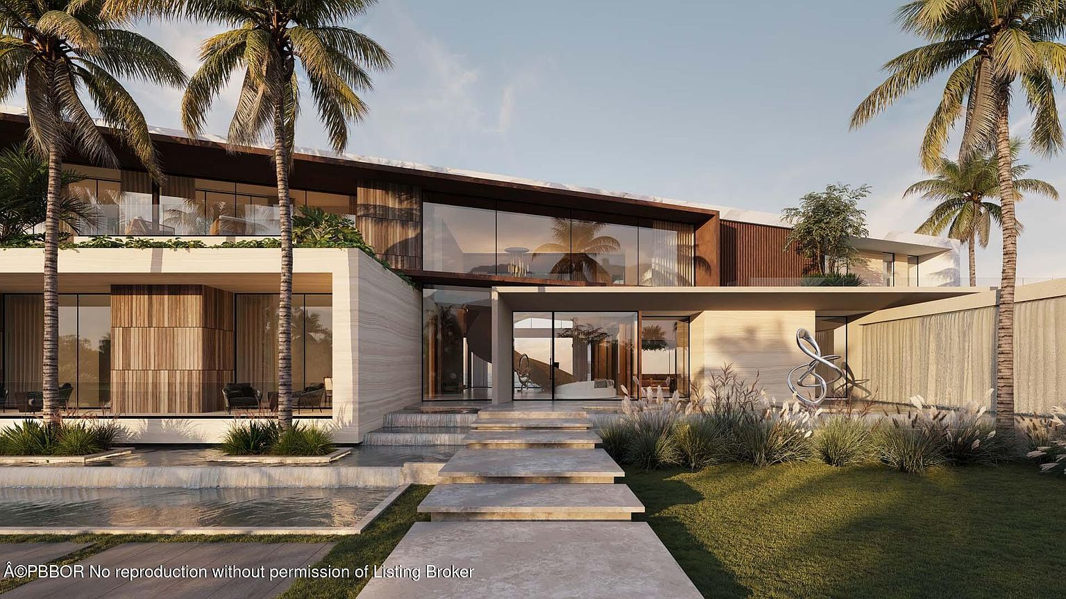 This is a striking front view of a modern luxury home, showcasing its architectural design with clean lines, large glass windows, and a flat roof. The property features a multi-level entrance with stone steps leading to the front door, complemented by lush landscaping, including palm trees and decorative grasses. A water feature adds to the upscale ambiance, creating an inviting and sophisticated curb appeal.