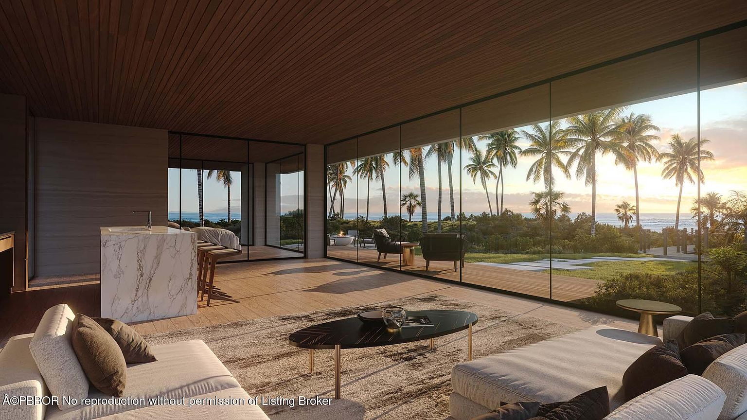 This is a luxurious living room with floor-to-ceiling windows offering stunning ocean views framed by palm trees. The interior features modern furnishings, including plush sofas, a stylish coffee table, and a sleek kitchen island, all set against a backdrop of natural wood and stone finishes. The open floor plan and abundant natural light create a serene and inviting atmosphere.