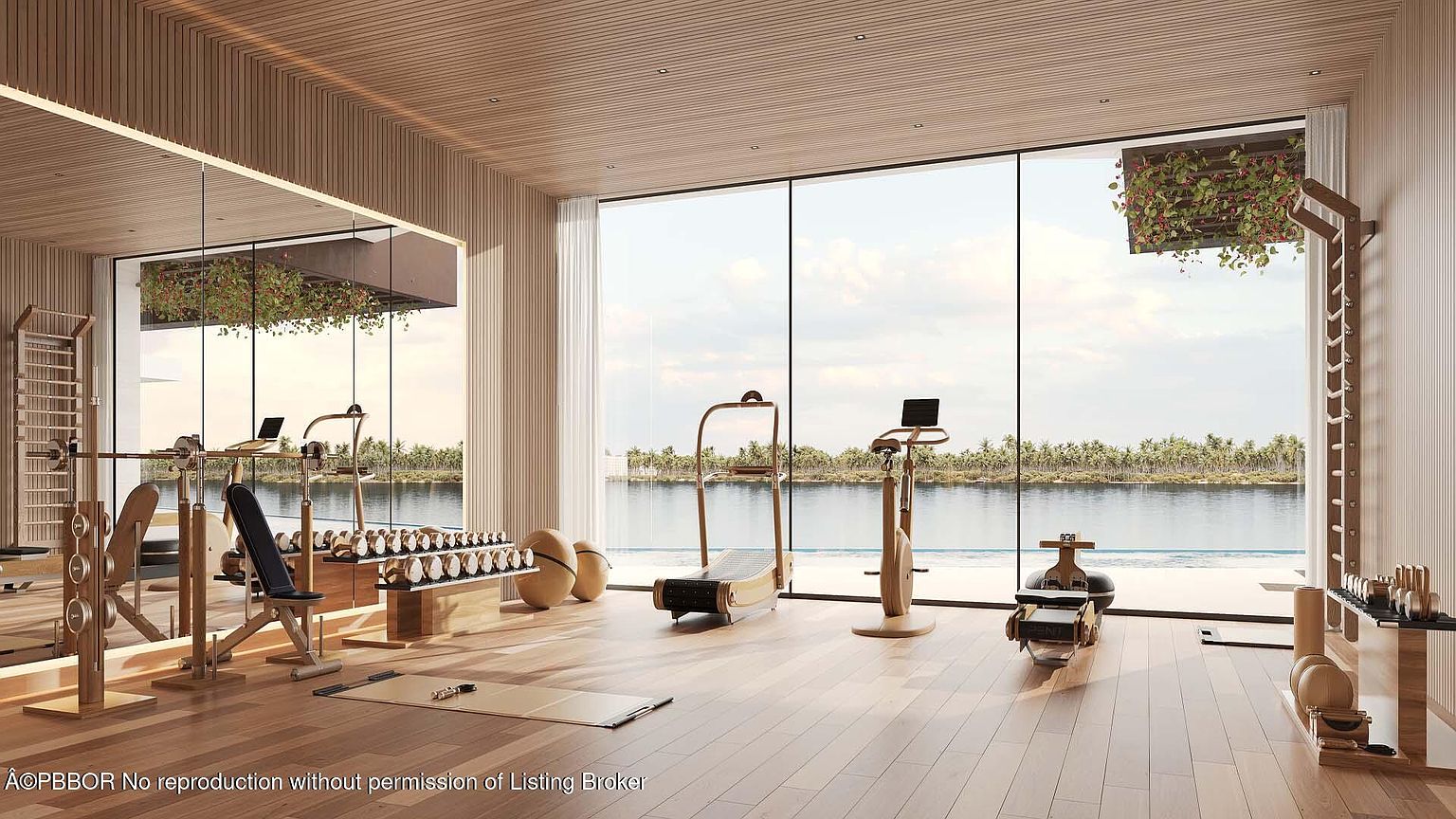 This is a luxurious home gym featuring wood flooring, wood paneled walls and ceiling, and floor-to-ceiling windows with a waterfront view. The gym is equipped with modern exercise equipment, including a treadmill, stationary bike, rowing machine, and weightlifting station. The natural light and serene setting create a calming and motivating workout environment.
