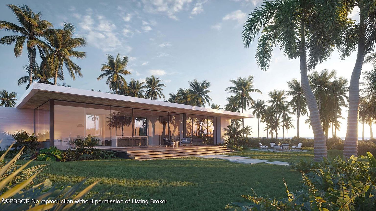 This image showcases the exterior of a modern home with a focus on the lush yard and garden. The house features large glass windows and a sleek, minimalist design, blending seamlessly with the surrounding palm trees and greenery. A patio area with outdoor seating suggests a relaxing and inviting space for enjoying the tropical landscape.