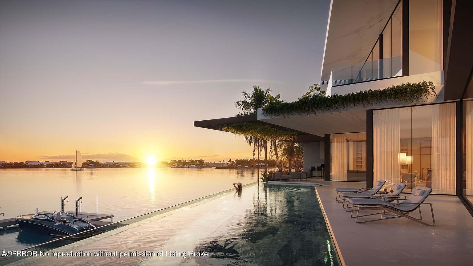 This image showcases a luxurious waterfront property featuring an infinity pool that seamlessly blends with the ocean at sunset. The modern architectural design includes a cantilevered deck with lush greenery, lounge chairs, and floor-to-ceiling windows that offer stunning views. A boat dock with a sleek motorboat adds to the property's appeal, creating an impression of high-end coastal living.
