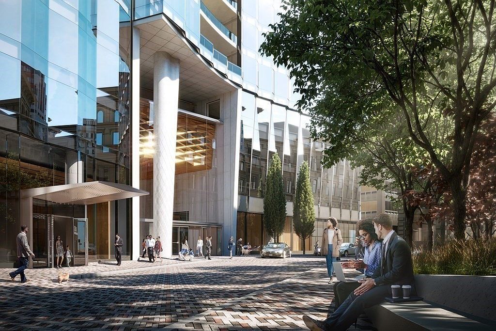 This architectural rendering showcases a sophisticated, modern building entrance featuring a prominent, textured white column and expansive glass curtain walls. The foreground includes a paved plaza with a bench where people are socializing, surrounded by lush trees and manicured landscaping. The scene conveys a high-end, urban professional atmosphere with a focus on contemporary design and pedestrian-friendly public space.