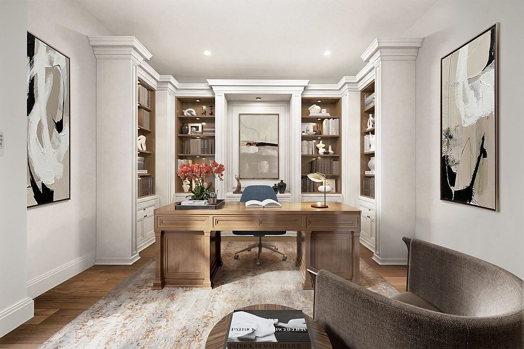 This sophisticated home office features custom built-in wooden shelving flanking a central desk, creating a symmetrical and professional workspace. The room is anchored by a large, warm-toned wooden desk and a plush area rug, complemented by elegant wall art and soft recessed lighting. The perspective is centered and eye-level, emphasizing the refined, classic aesthetic and organized layout of the study.