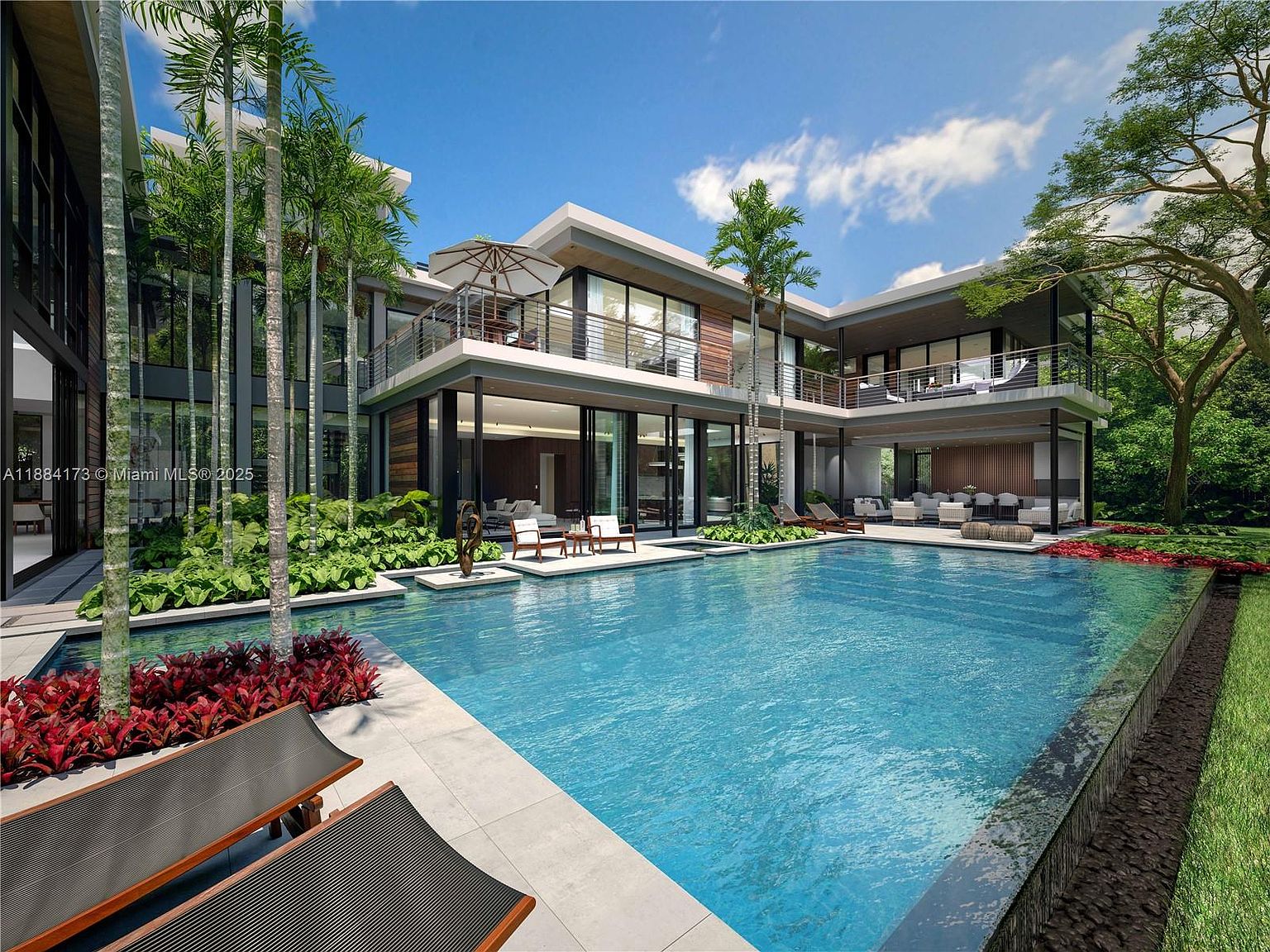 This image showcases a luxurious modern home with a large, inviting swimming pool as its focal point. The pool is surrounded by lush landscaping, including palm trees and vibrant red foliage, creating a serene and private oasis. The architecture features clean lines, expansive glass windows, and balconies, blending indoor and outdoor living seamlessly.