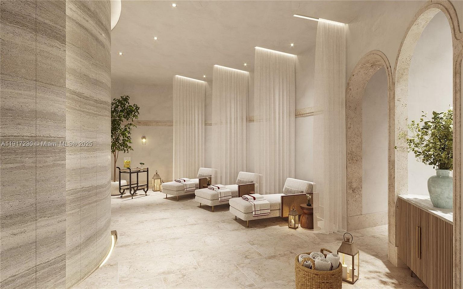 This serene spa or relaxation lounge features a neutral, monochromatic palette with textured stone walls and soft, draped fabric partitions. Three cushioned chaise lounges are arranged in a row, each accompanied by a small side table and a decorative lantern, creating a tranquil atmosphere. The space is framed by a graceful stone archway on the right and a curved wall on the left, emphasizing a sophisticated, resort-style aesthetic.