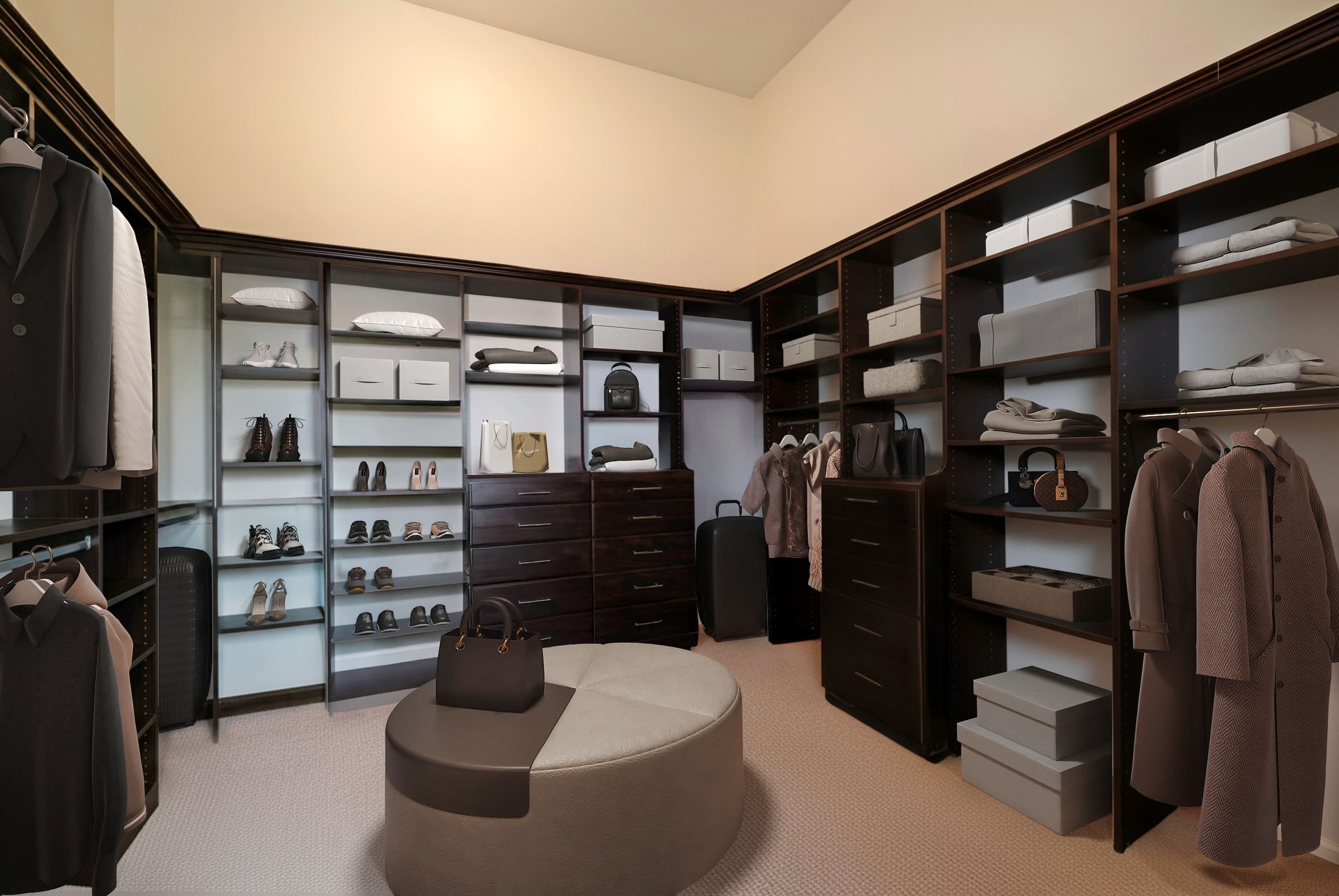 This is a well-organized walk-in closet featuring custom dark wood shelving and drawers. The closet is equipped with ample storage for clothing, shoes, and accessories. An ottoman in the center of the room adds a touch of luxury and functionality to the space.