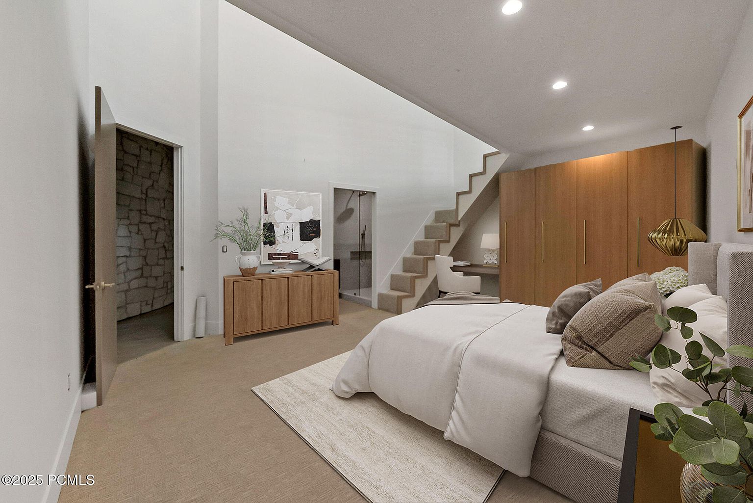 This is a primary bedroom featuring a neutral color palette, a large bed with multiple pillows, and a built-in wardrobe. The room has a modern design with clean lines and a minimalist aesthetic. A staircase leads to an upper level, and there's a small desk area integrated into the design.