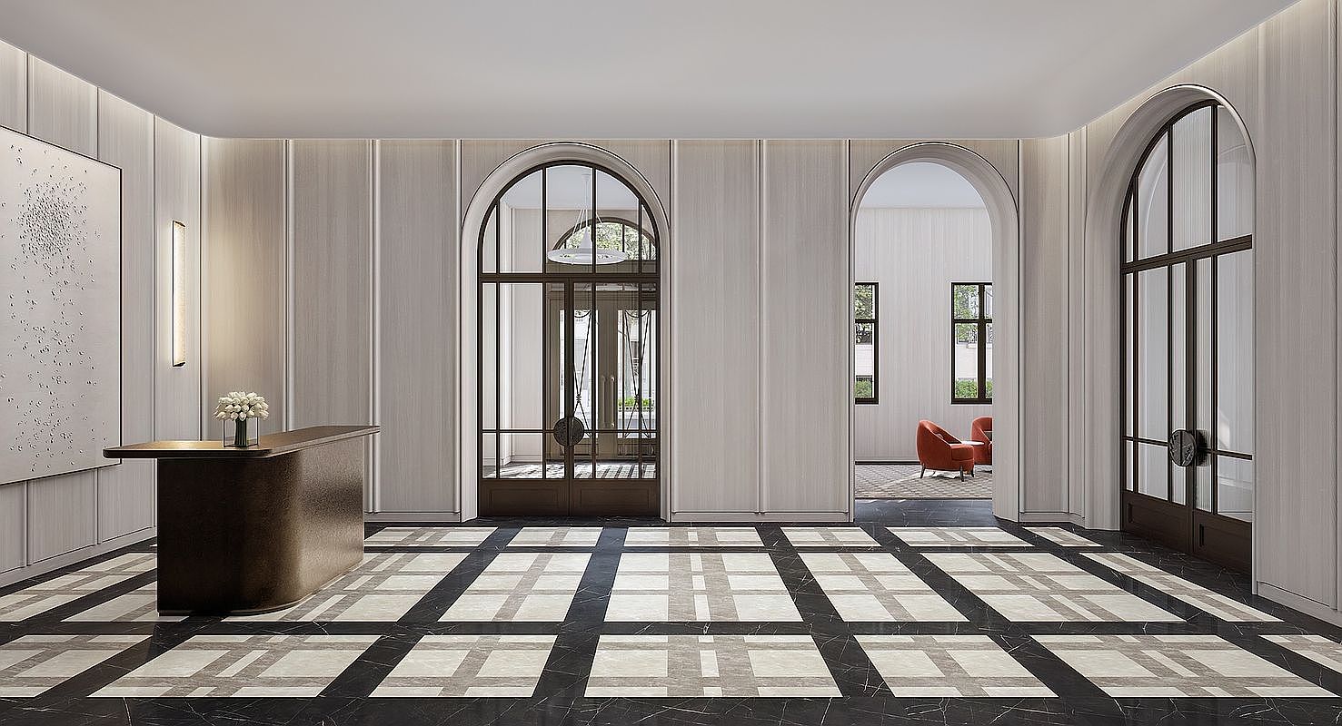 This elegant lobby or grand entrance hall features a sophisticated, high-end design with a striking black and white geometric marble floor. The space is defined by arched glass-paned doors, light-toned wood-paneled walls, and a sleek, minimalist reception desk. The perspective is a wide, symmetrical shot that emphasizes the architectural symmetry and luxurious, refined atmosphere of the building's common area.