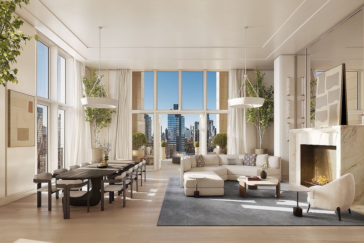 This sophisticated, open-concept living and dining area exudes luxury with its high ceilings, floor-to-ceiling windows, and a seamless transition to a private terrace overlooking a city skyline. The space features a plush, cream-colored sectional sofa, a sleek dark wood dining table, and a grand marble fireplace, all anchored by a large, textured area rug. The neutral color palette and elegant lighting fixtures create an airy, upscale atmosphere perfect for high-end urban living.