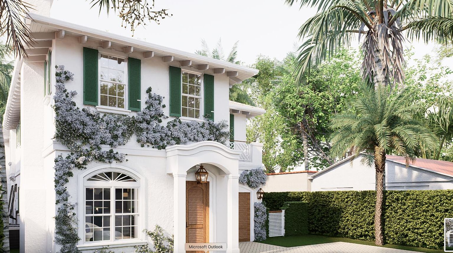 This is a charming front view of a two-story white house with green shutters and climbing flowering vines. The house features an arched entryway with a wooden door and a well-manicured lawn with a tall hedge and palm trees in the background. The overall impression is one of classic elegance and curb appeal.