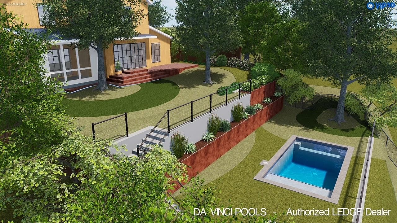 This image showcases a beautifully landscaped backyard featuring a modern in-ground pool, tiered garden beds with retaining walls, and lush green lawns. The design incorporates a seamless transition from the house to the outdoor space, creating an inviting and functional area for relaxation and entertainment. Mature trees provide shade and privacy, enhancing the overall appeal of the property.